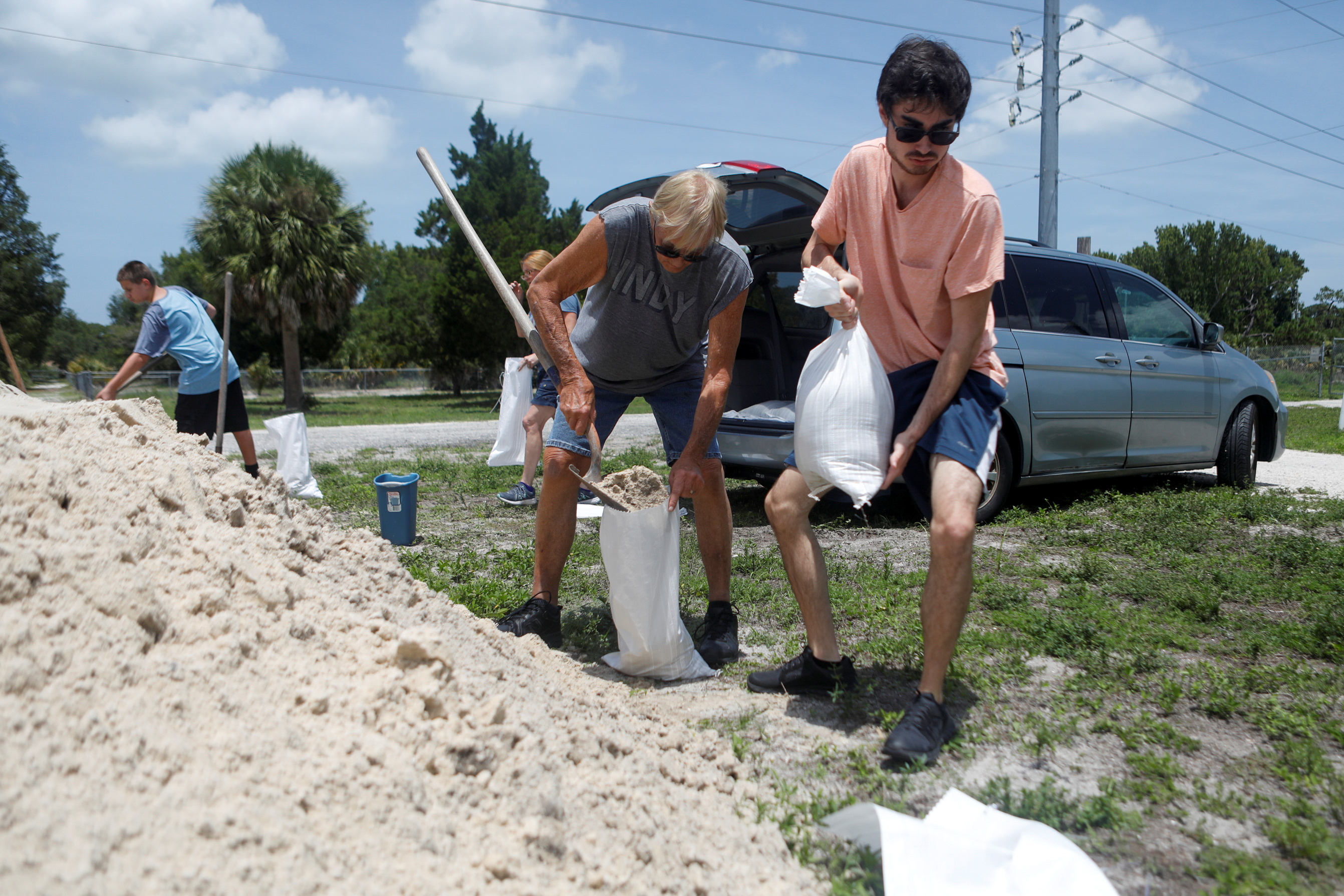 Residents in Florida preparing sandbags to help prevent flooding in their homes ahead of Tropical Storm Elsa, in Seminole, Florida, US