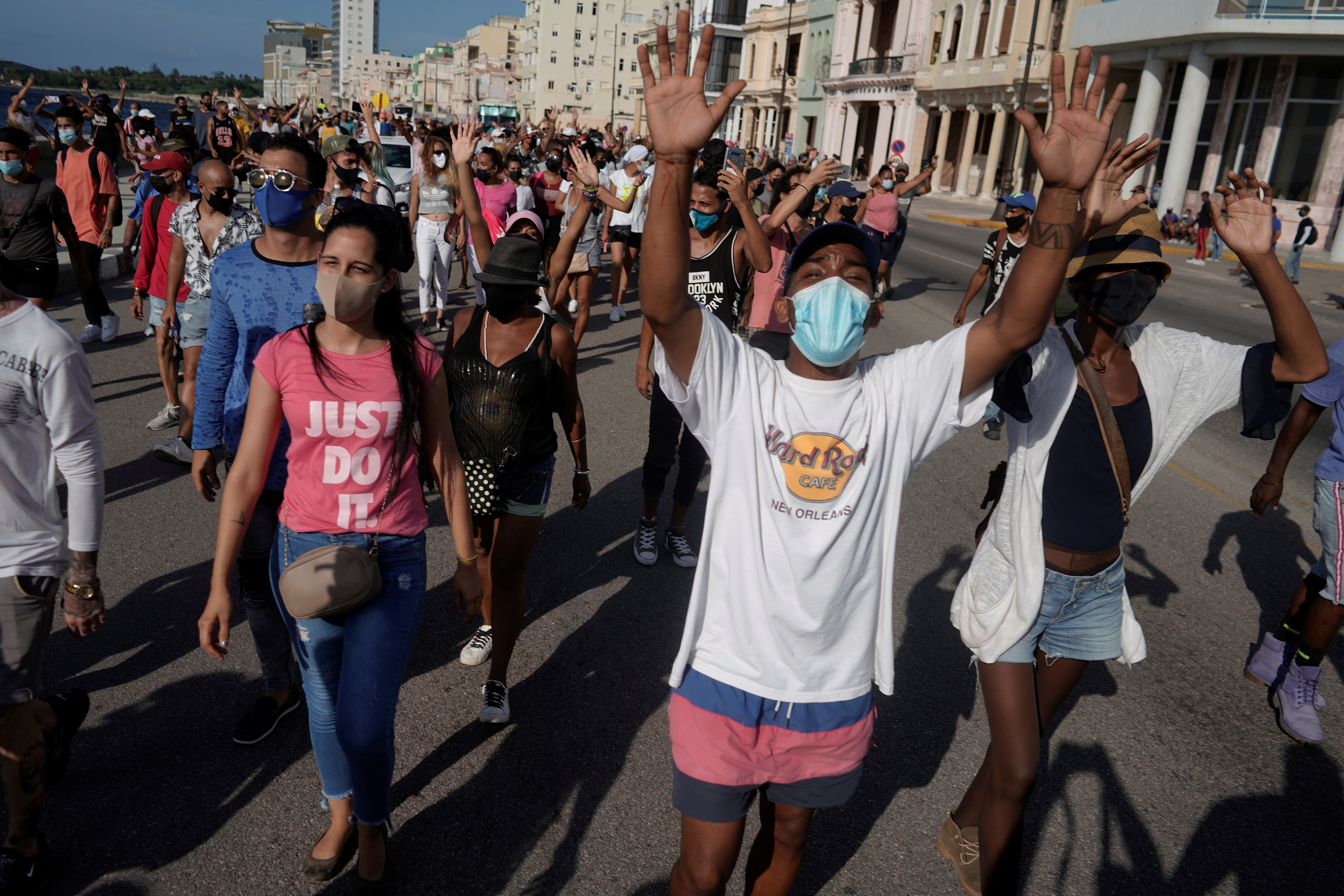 People shout slogans against the government during a protest in Havana on July 11