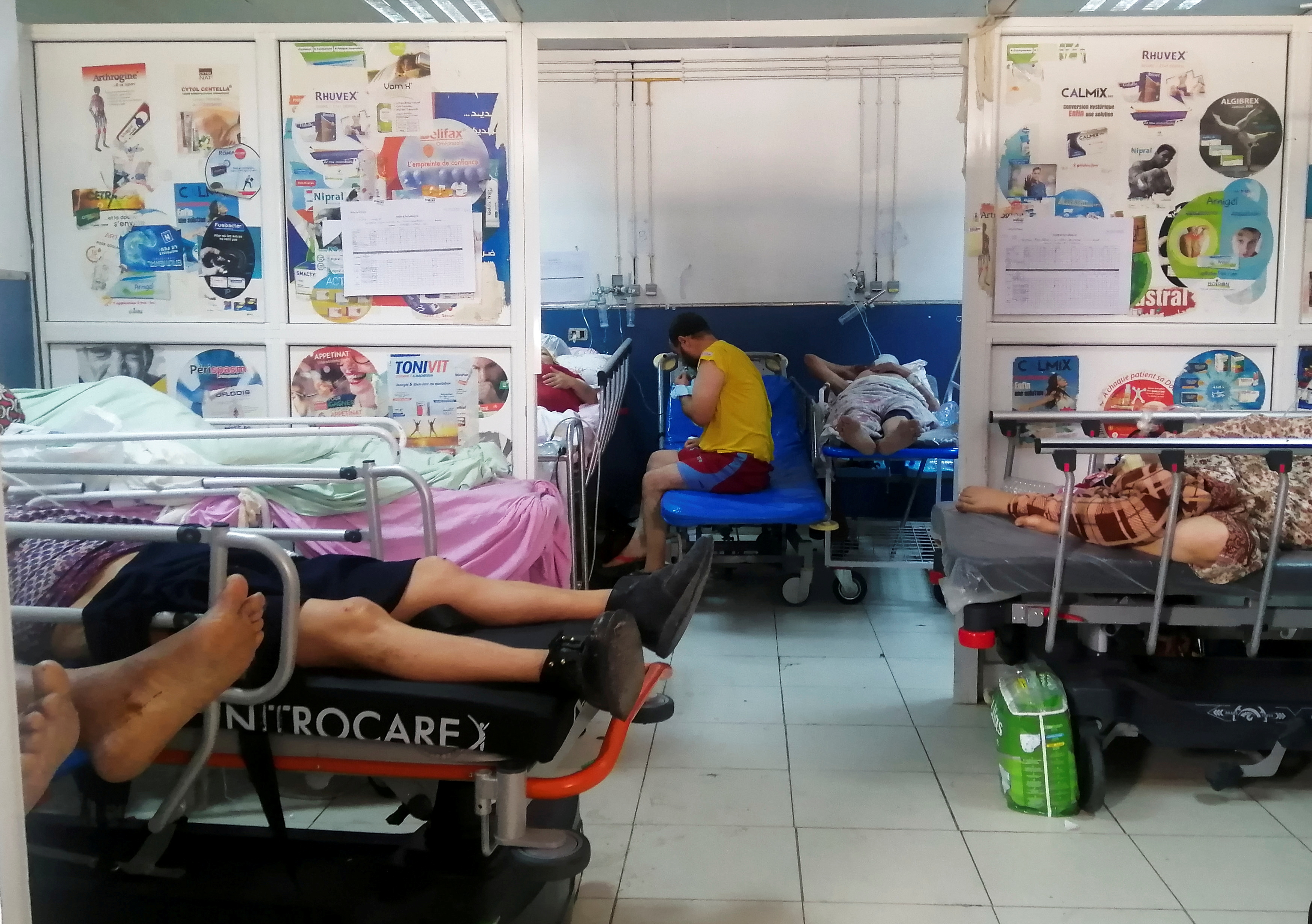 Patients suffering from the coronavirus disease (COVID-19) receive treatment at the emergency department of Charles Nicolle Hospital in Tunis, Tunisia