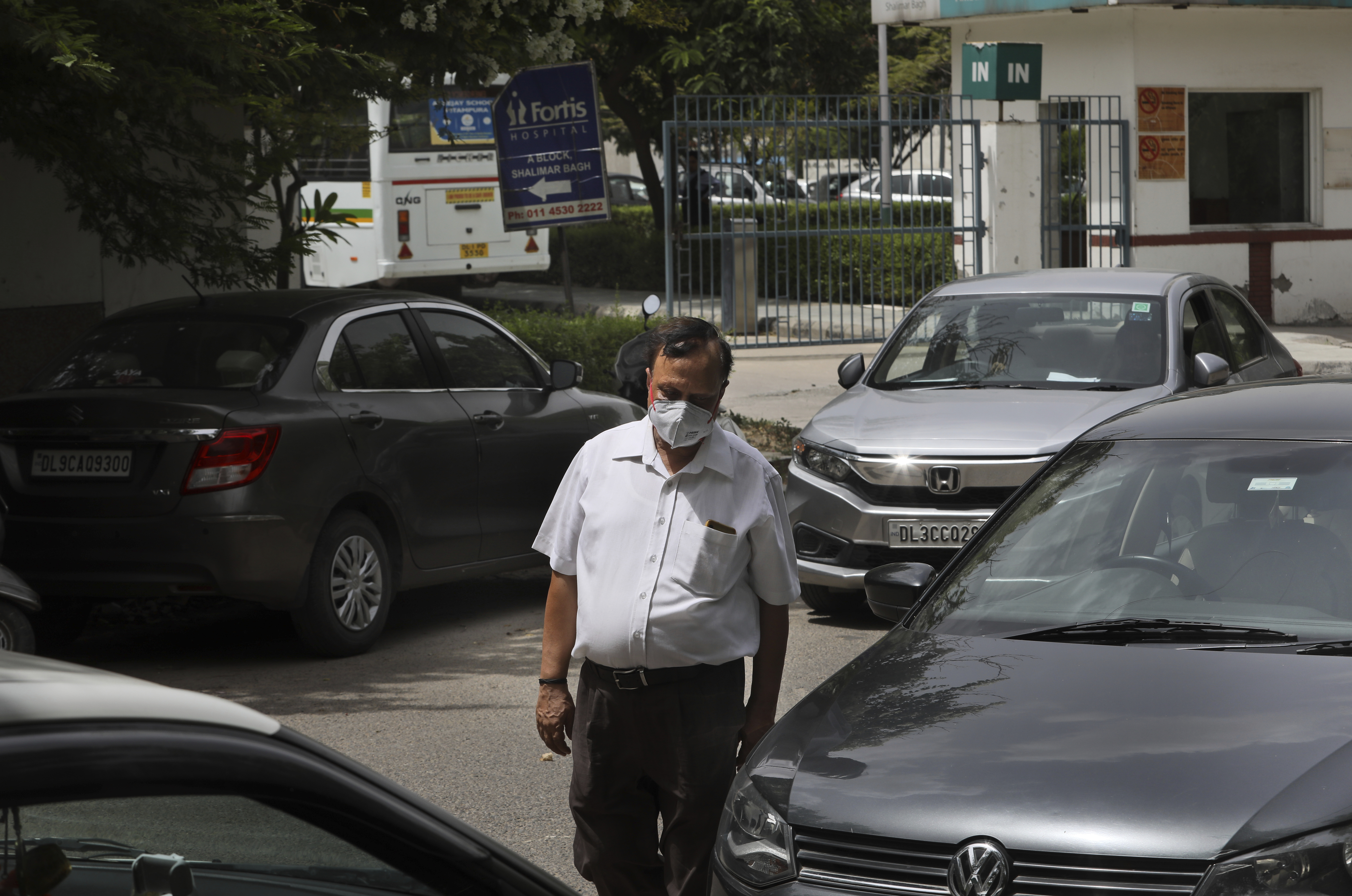 Sharma after visiting his son Saurav who is being treated for COVID-19 at a private hospital in New Delhi