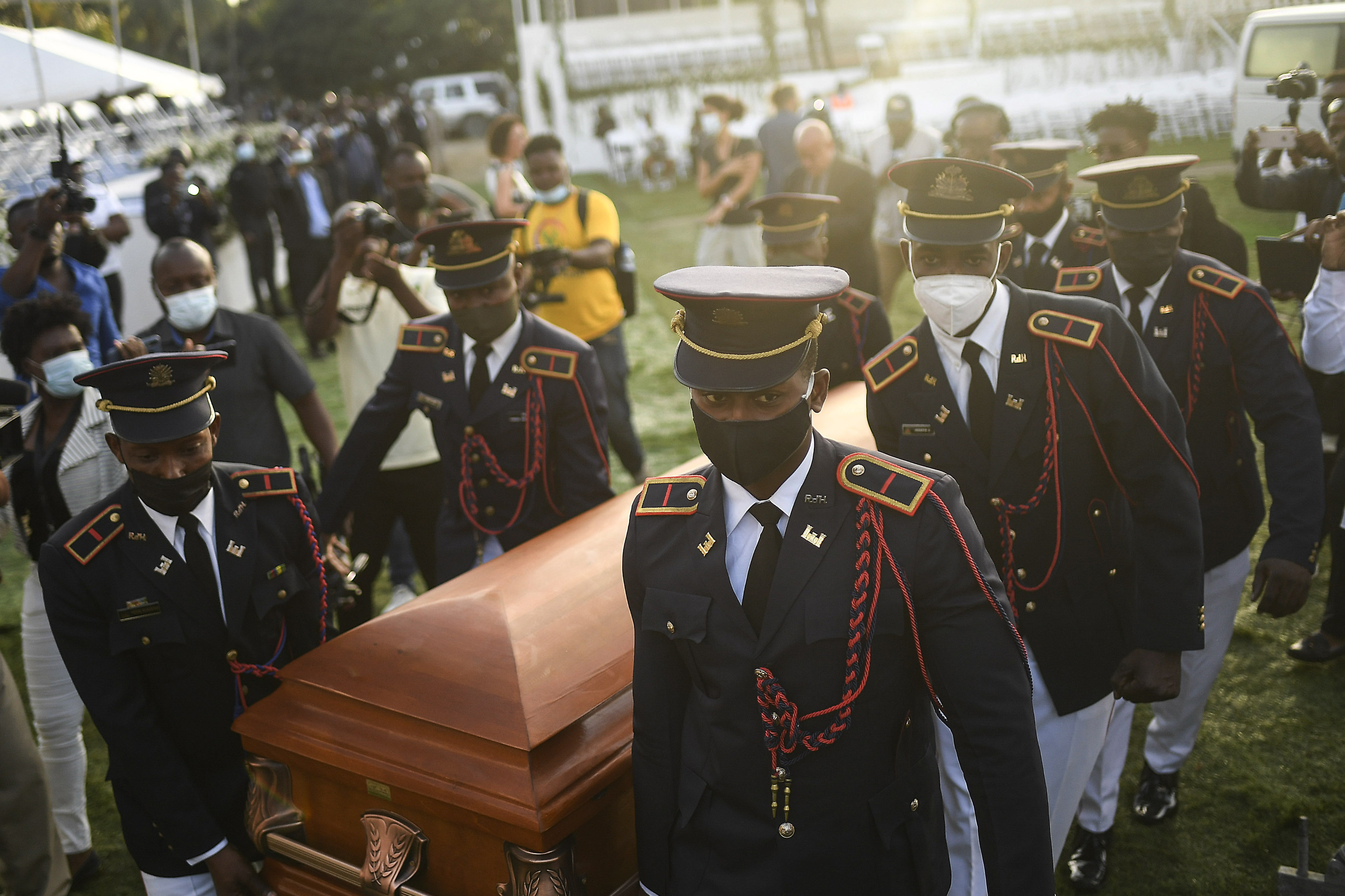 Pallbearers carrying the coffin of slain Haitian President Jovenel Moise at the start of the funeral at his family home in Cap-Haitien, Haiti