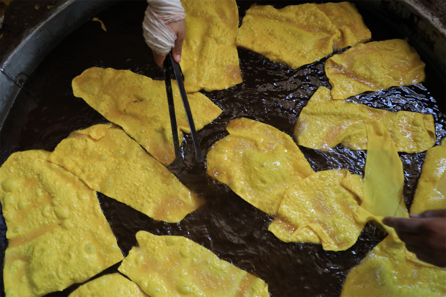One of Herat’s delicacies: gosh-e-fil, or elephant ears, made by frying dough and sprinkling powdered sugar and pistachio
