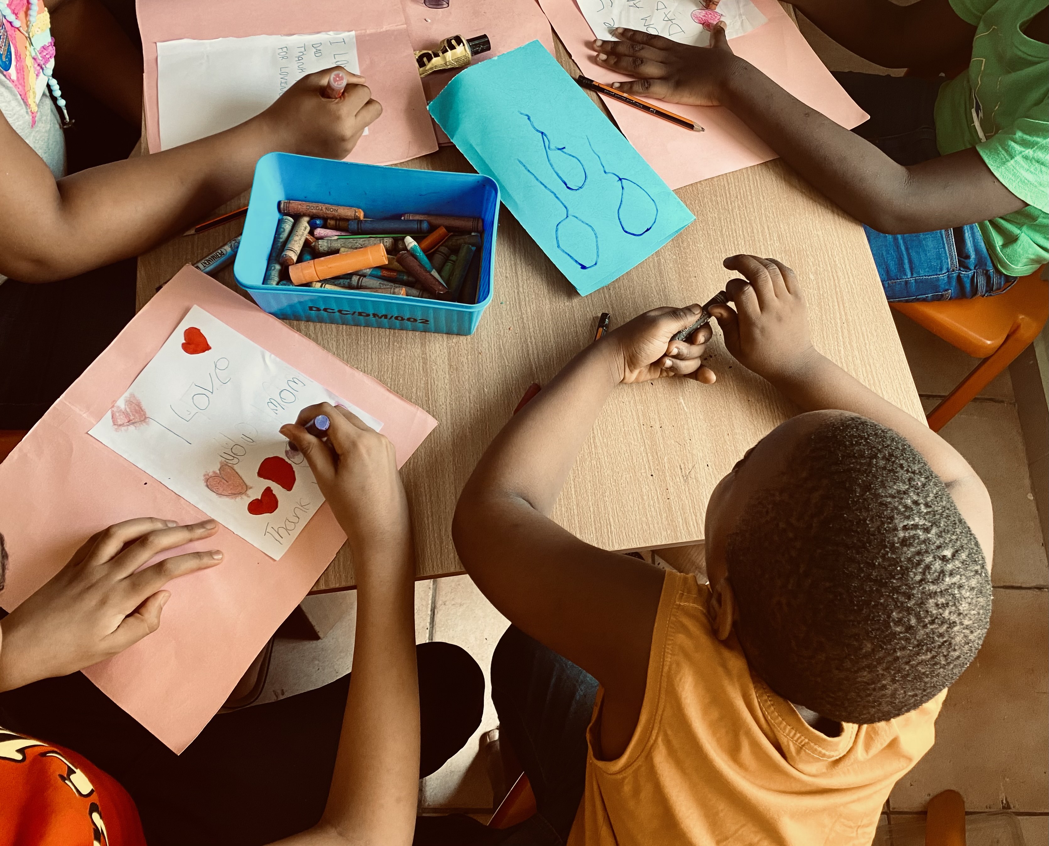 Children work in their classroom at CADET Academy in Abuja, Nigeria [Kemi Falodun/Al Jazeera]