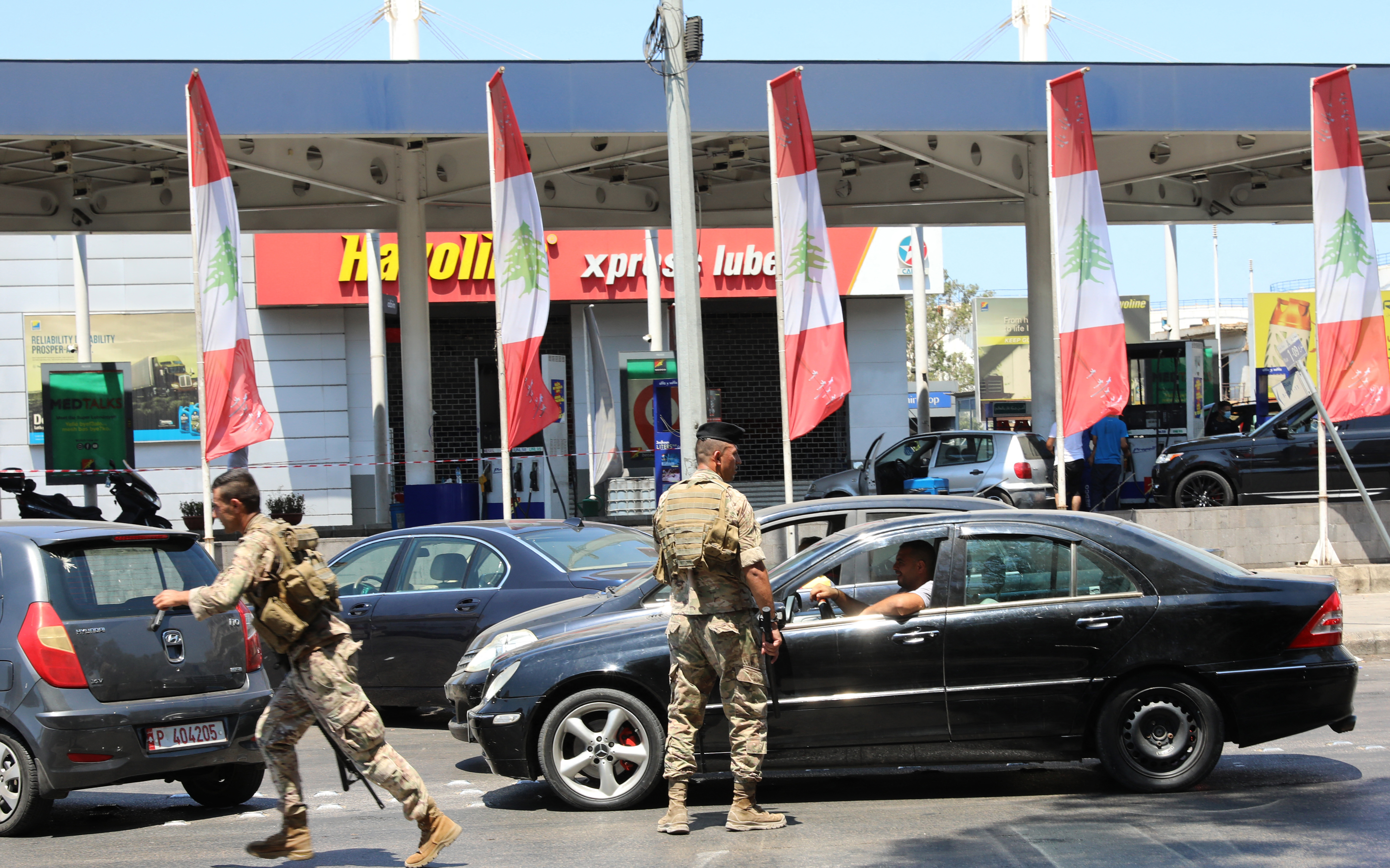 A Lebanese soldier directs traffic