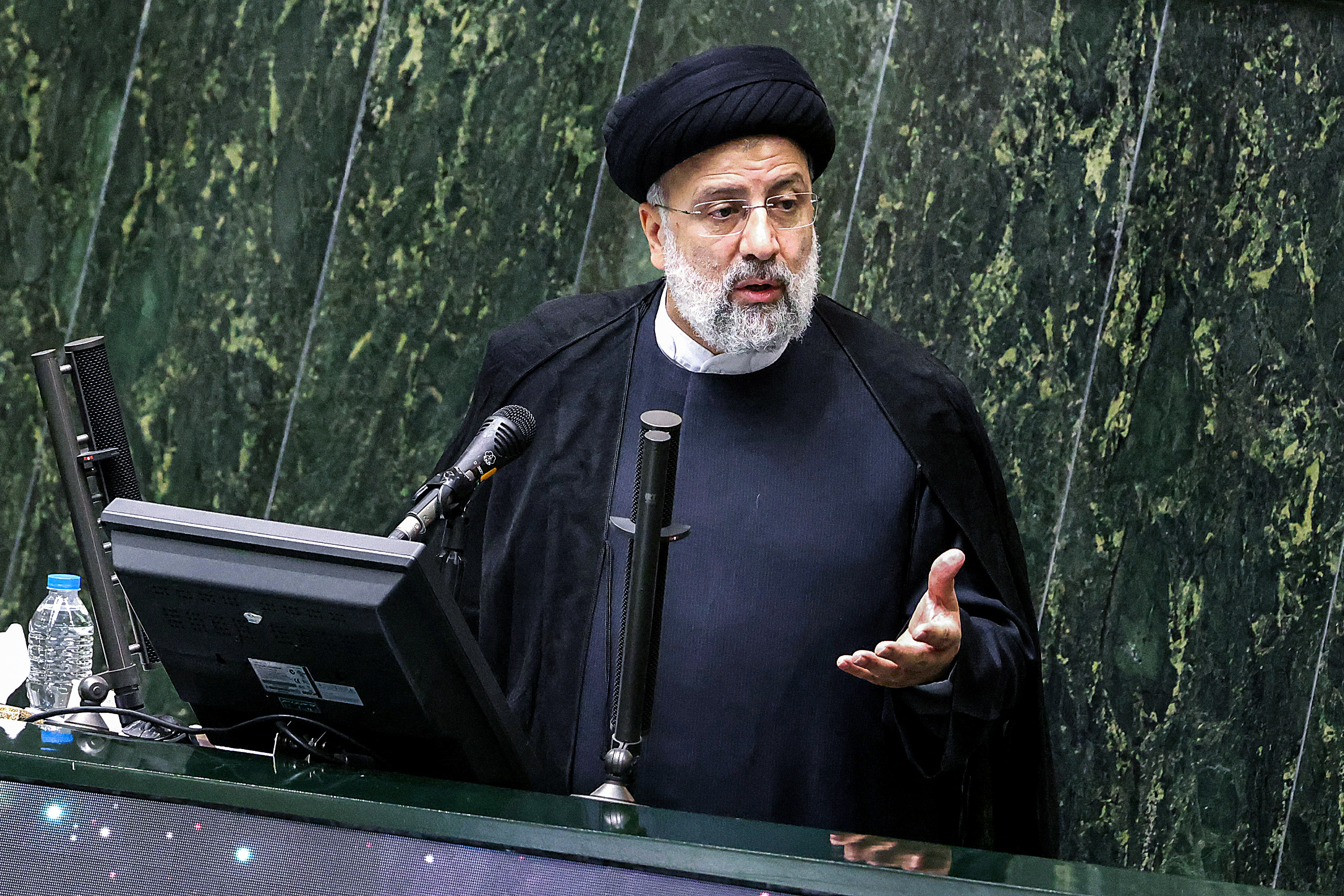 Iran’s President Ebrahim Raisi defends his cabinet choices before parliament