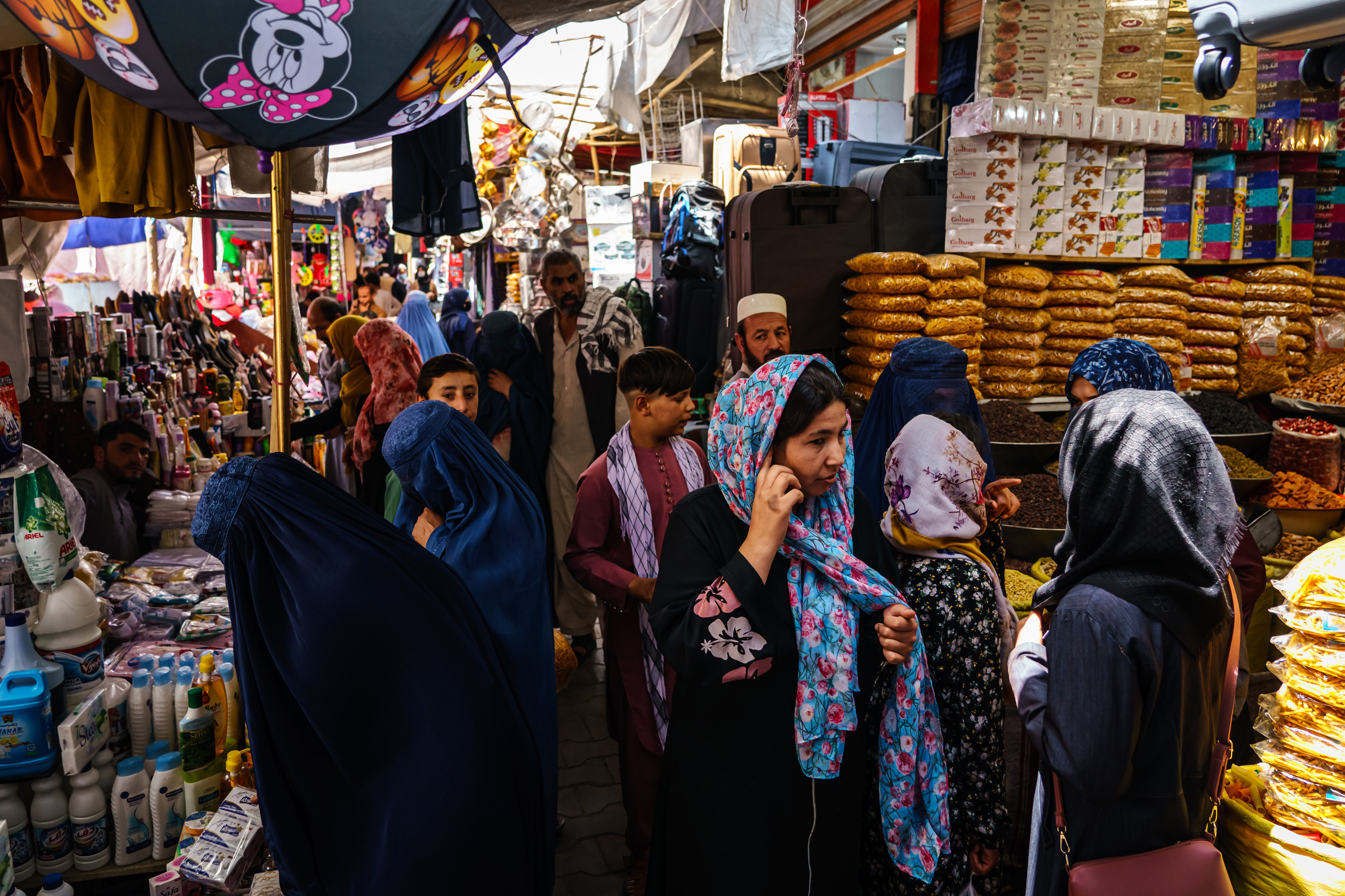 Women shop in the Lycee Maryam Bazaar in the Khair Khana neighborhood in Kabul, Afghanistan, Monday, August 23, 2021