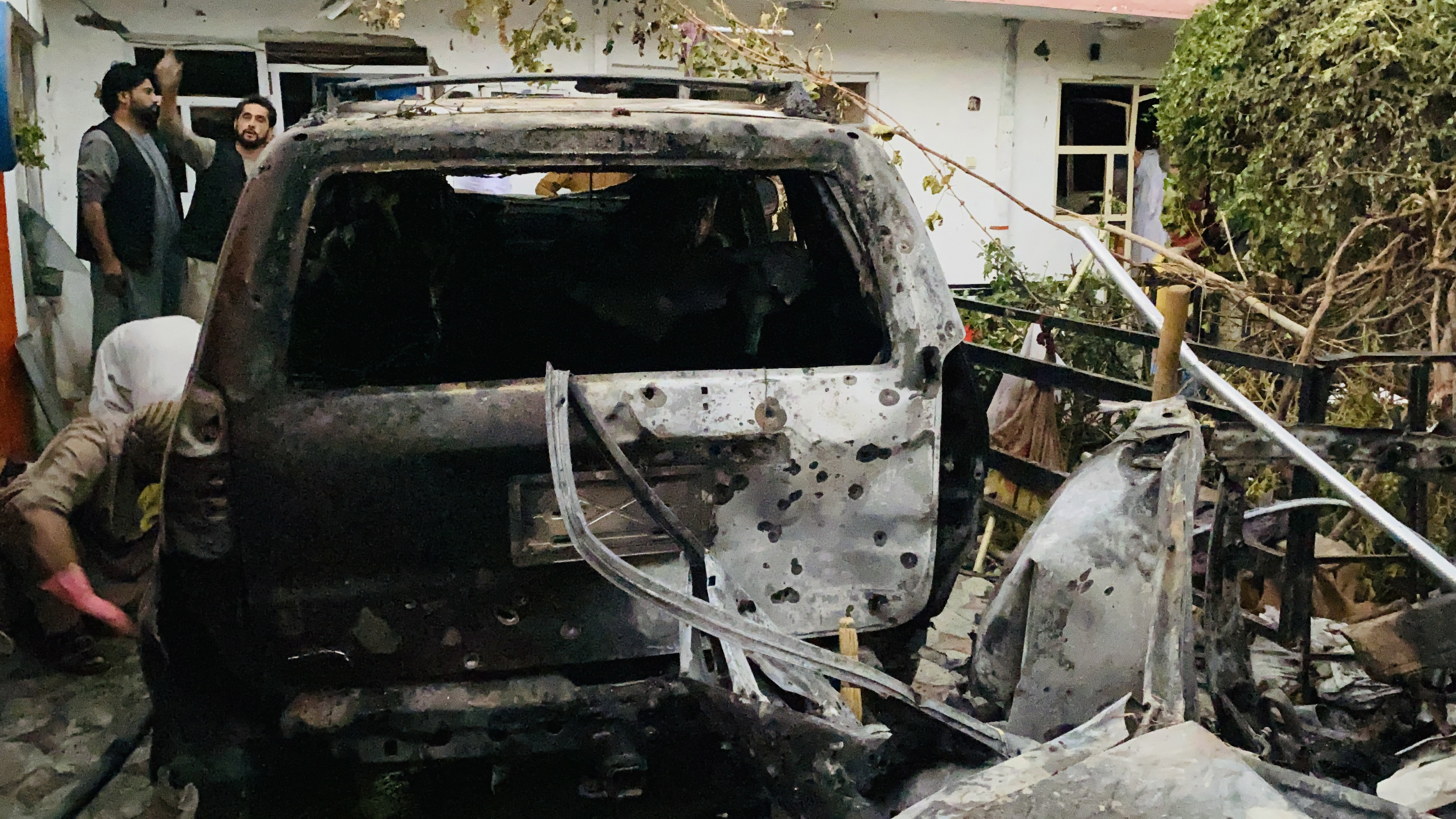Photo shows damage following an attack near the Hamid Karzai International Airport in Kabul, Afghanistan