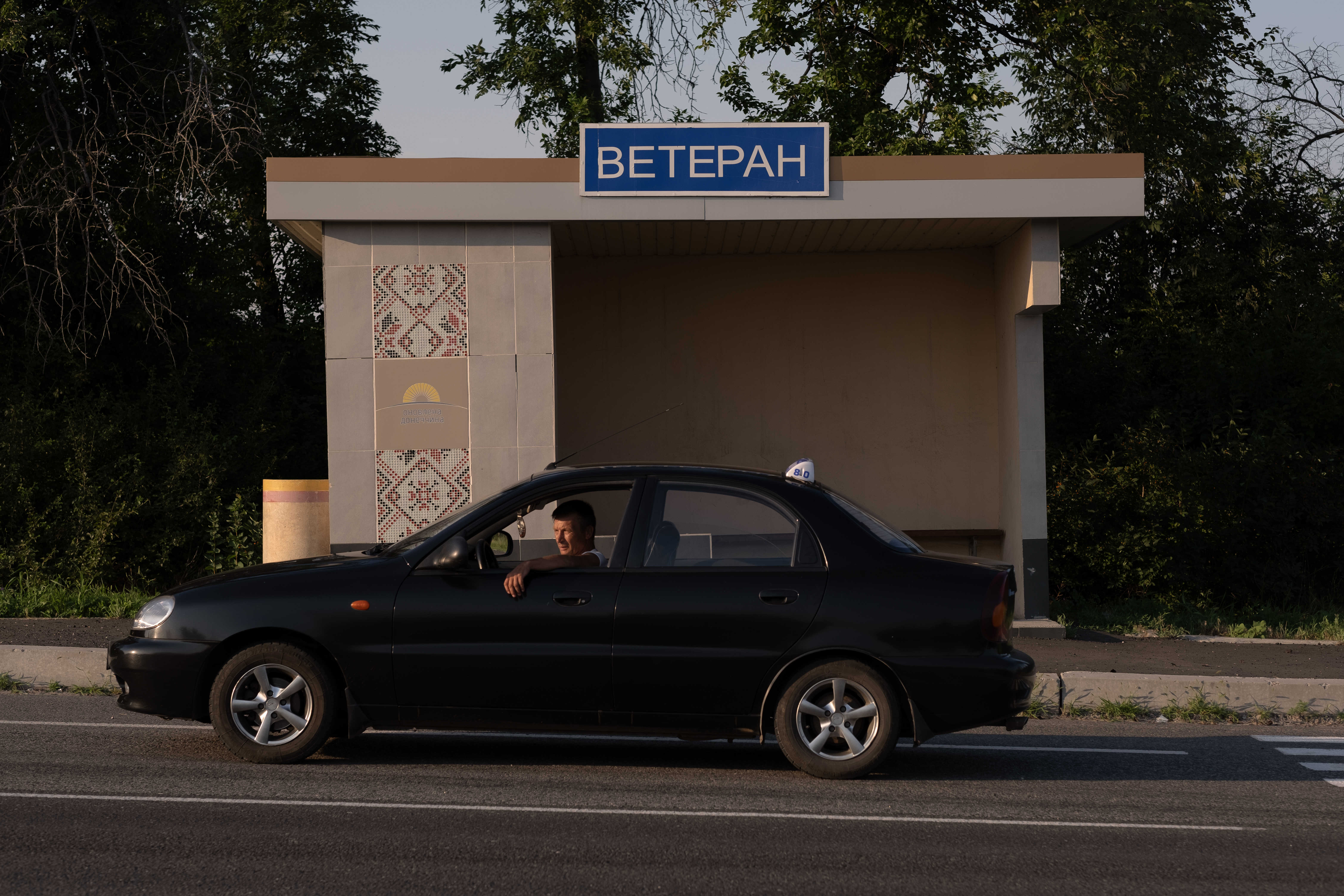 A bus stop called ‘veteran’ sits just outside the militarised zone in the Donetsk region