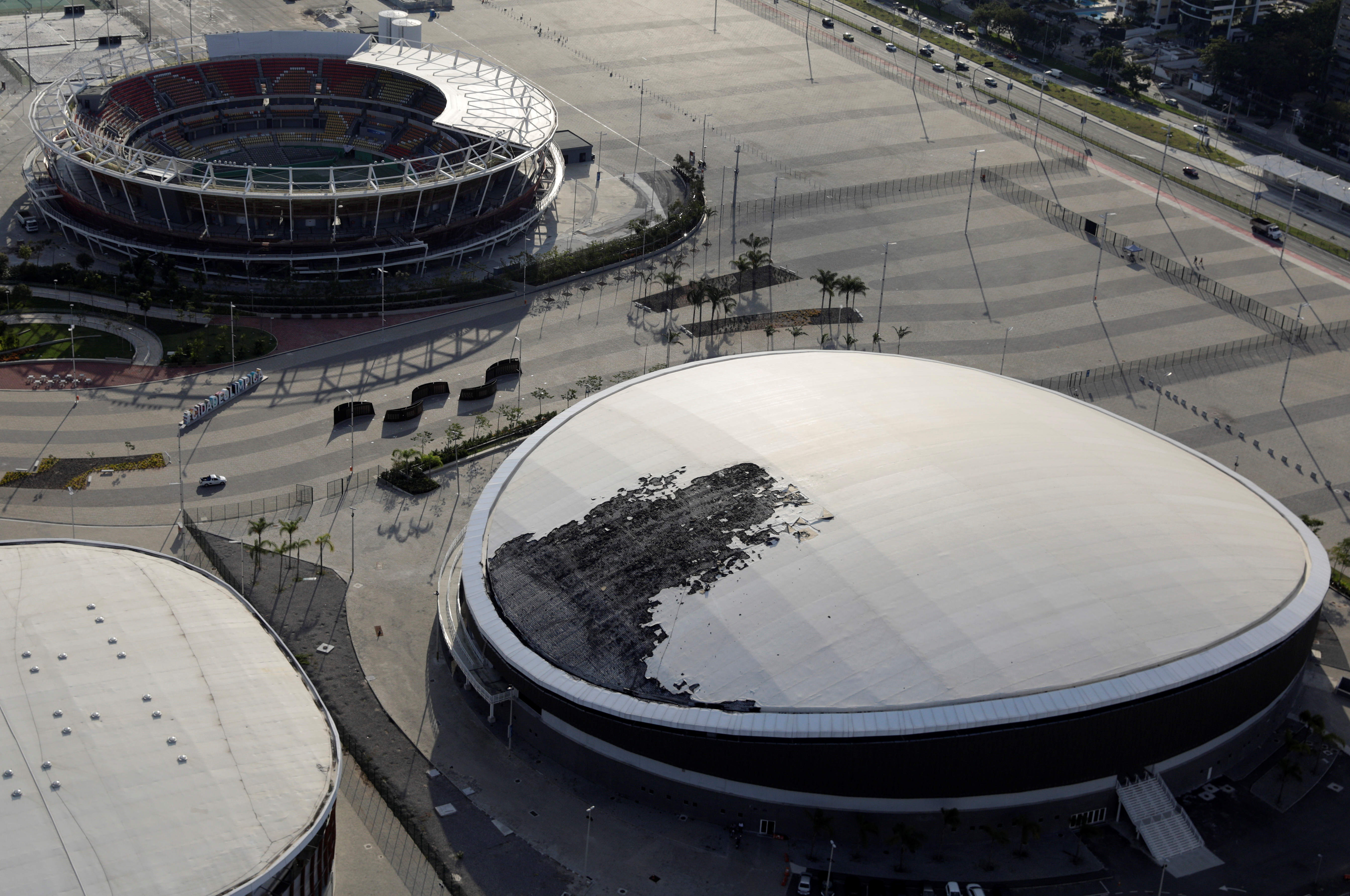 An aerial view from 2017 shows the Velodrome, with its roof partially burned after a fire at the Olympic Park, previously used for the Rio 2016 Olympics