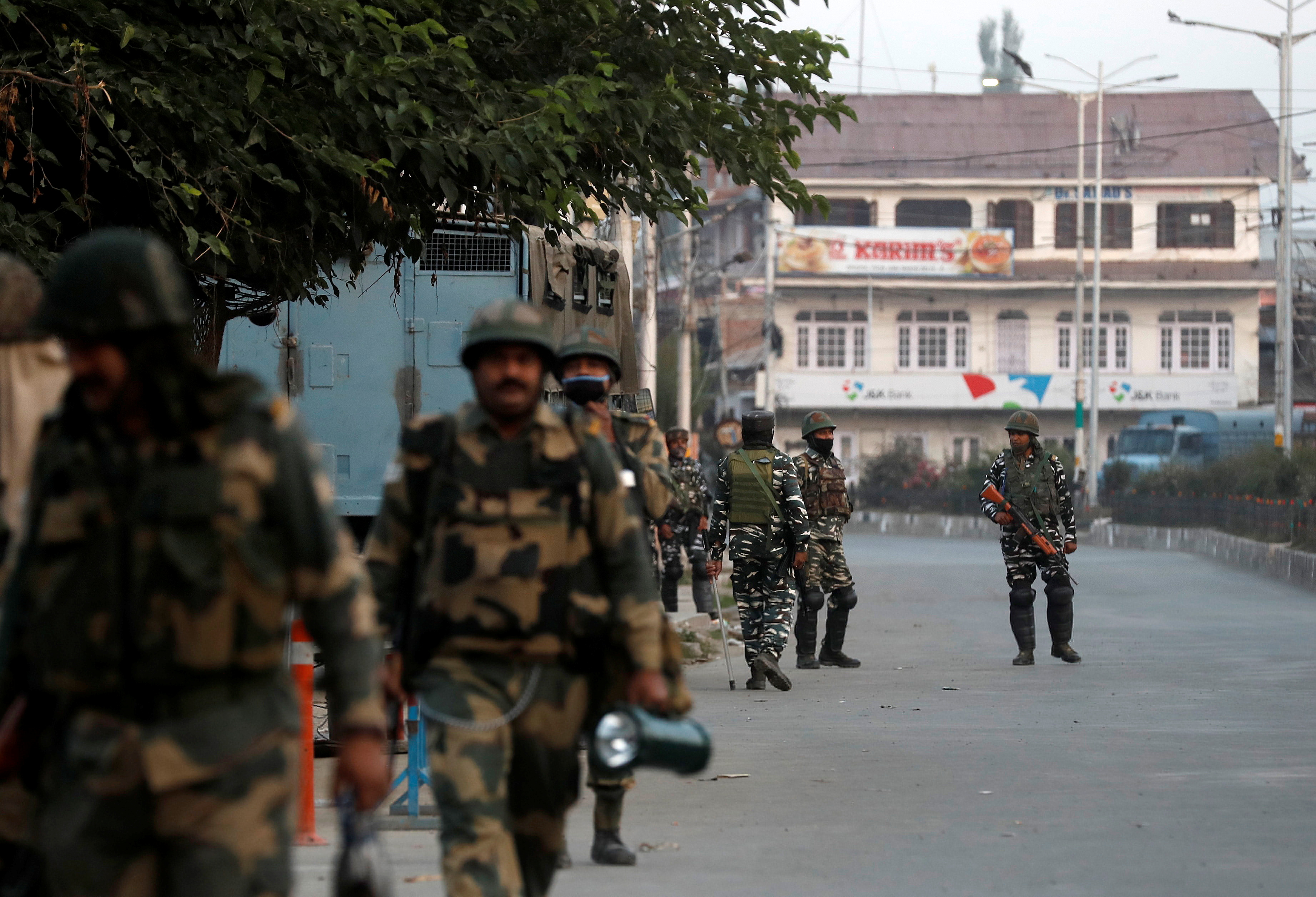 Indian security forces patrol near Geelani’s residence in Srinagar