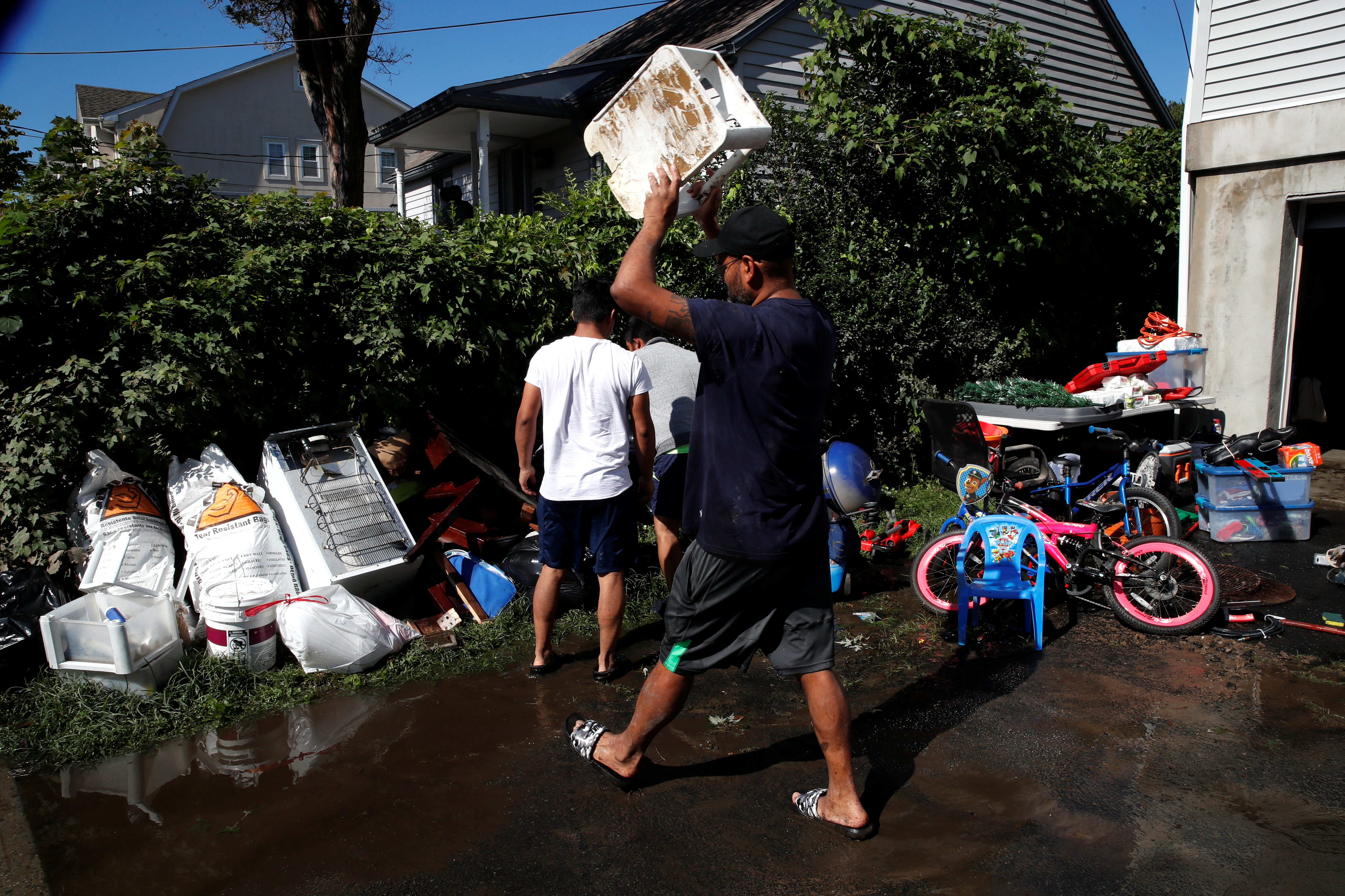 Residents discarded belongings from a flooded house after remnants of Ida brought drenching rain, flash floods and tornadoes to parts of the Northeast in Mamaroneck, New York, US