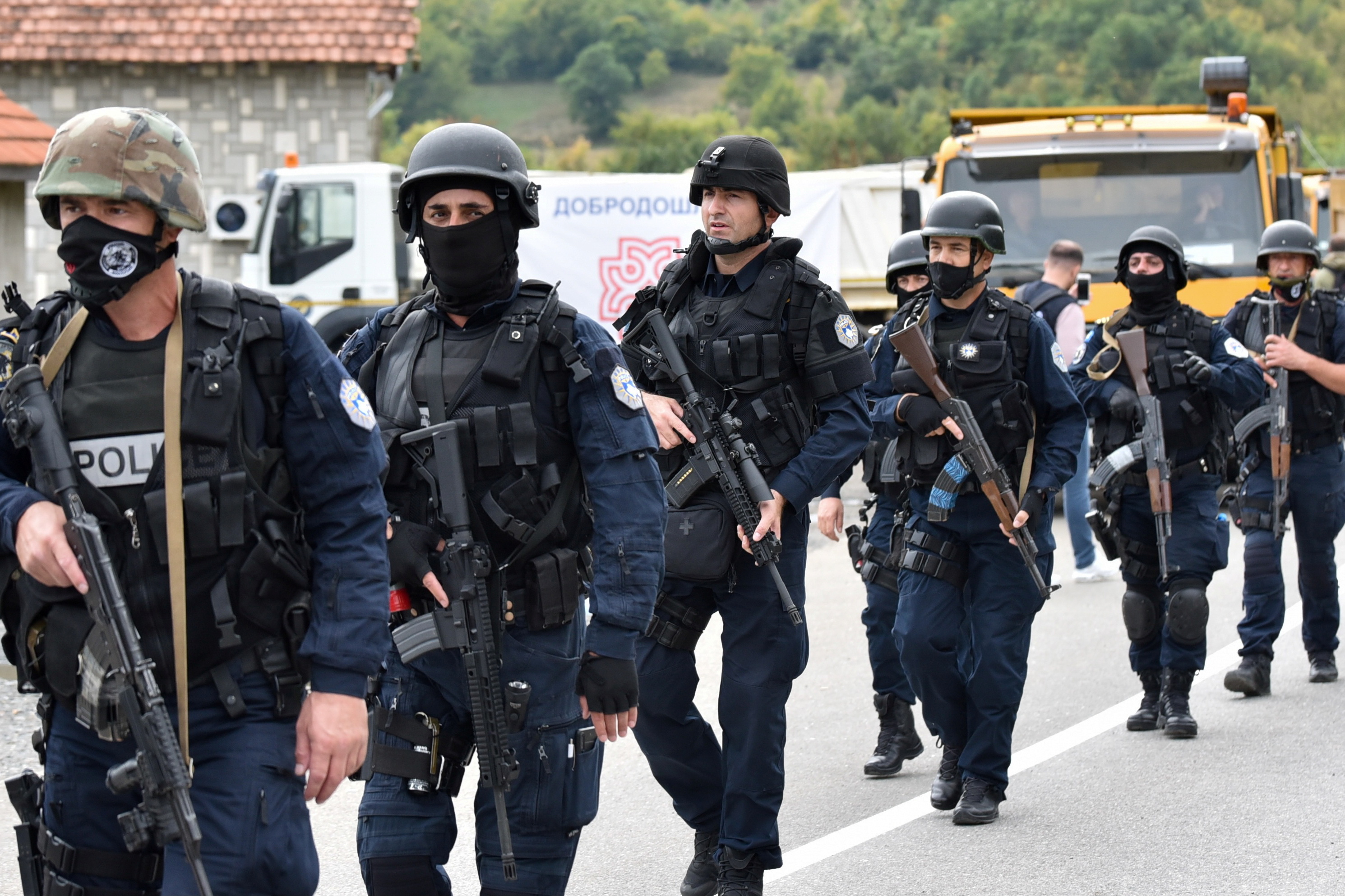 Kosovo special police officers are pictured as hundreds of Kosovo Serbs protest against a government ban on the entry of vehicles with Serbian registration plates in Jarinje, Kosovo