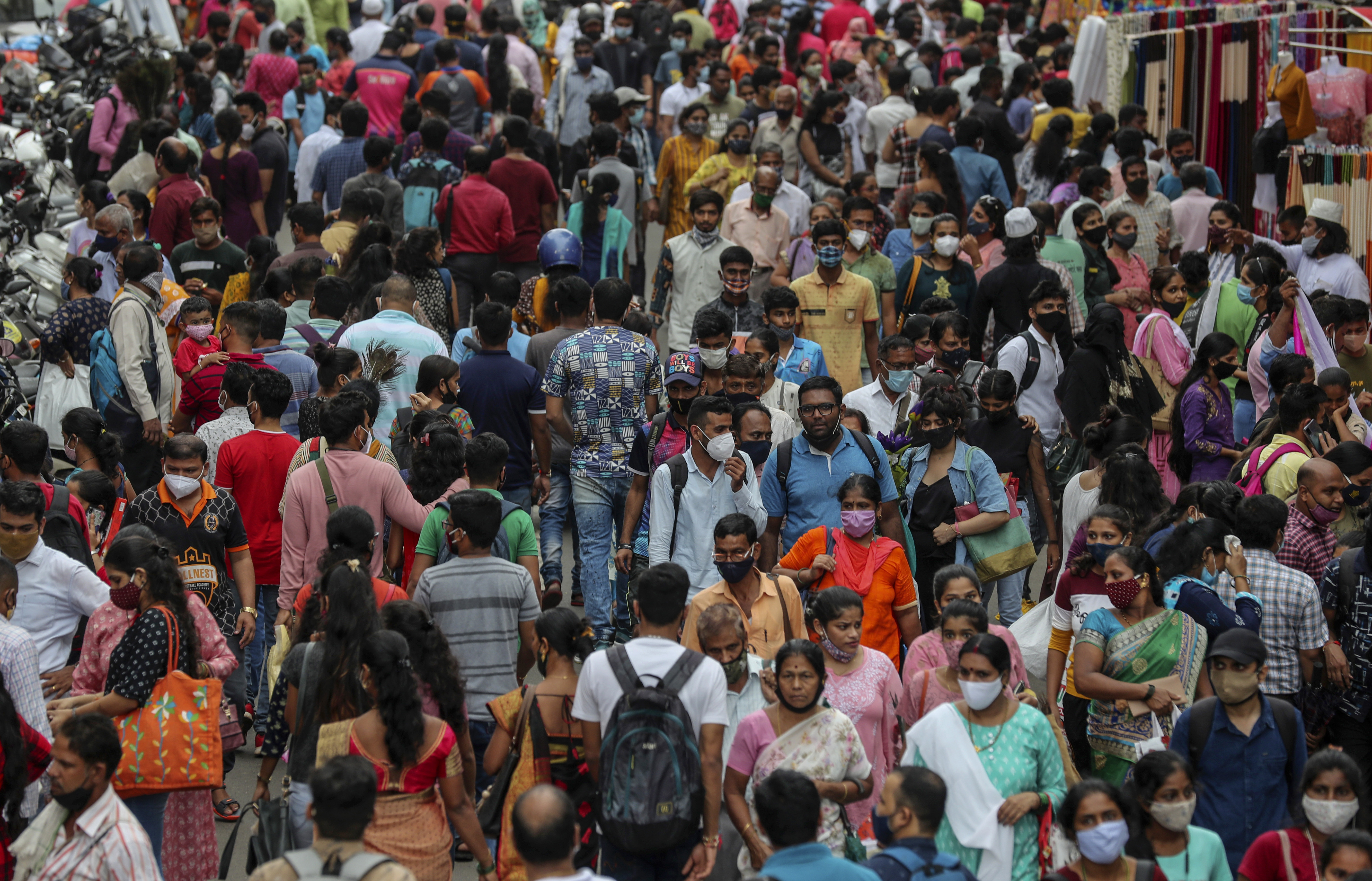 People crowd a market ahead of the Ganesh Chaturti festival in Mumbai