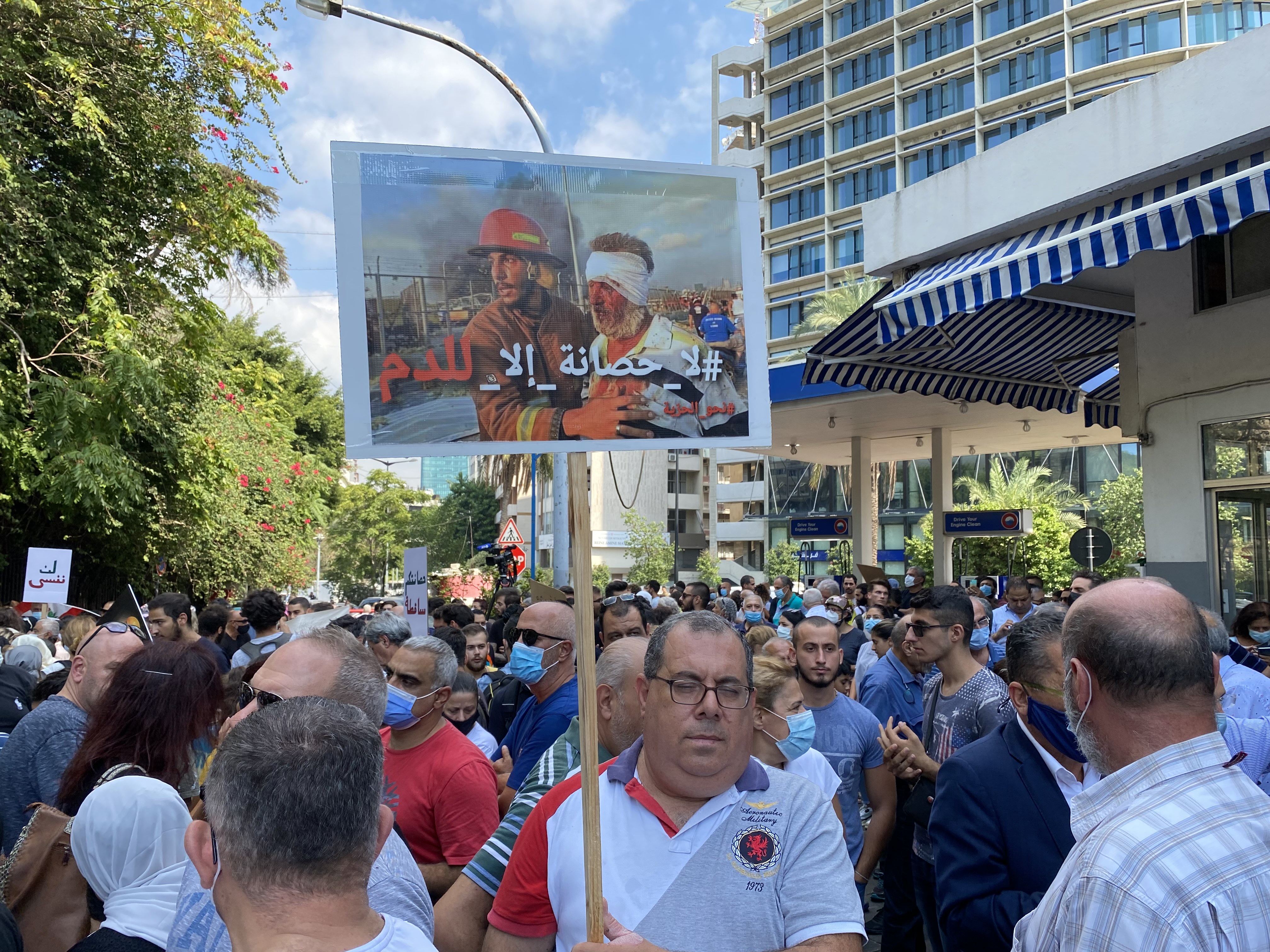 Protesters demand justice over the blast which killed at least 218 people