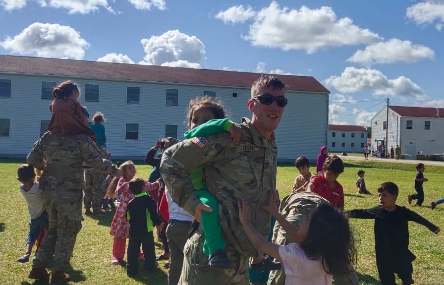 Military bases across the US are housing thousands of Afghans awaiting immigration processing [Zubair Babakarkhail/Al Jazeera]