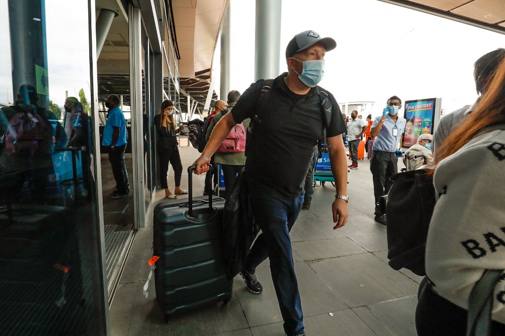 International tourists arrive at the Sir Seewoosagur Ramgoolam International Airport