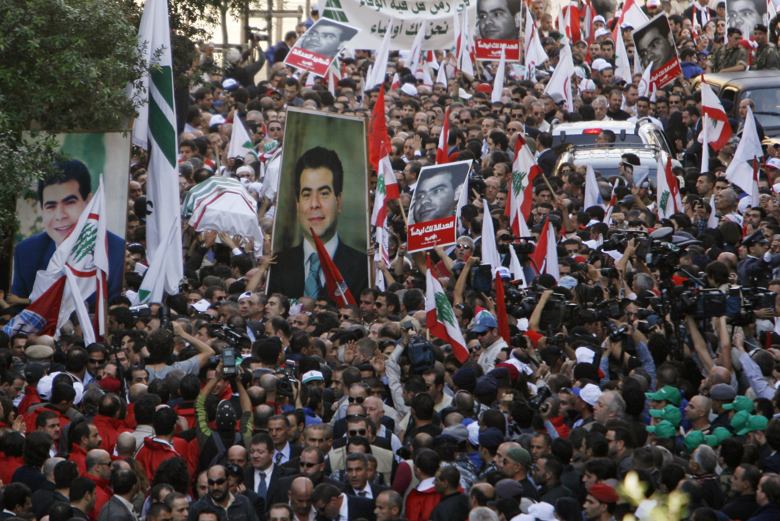 The coffin of assassinated Lebanese Industry Minister Pierre Gemayel is carried by supporters at a church in Beirut, Lebanon on November 23, 2006
