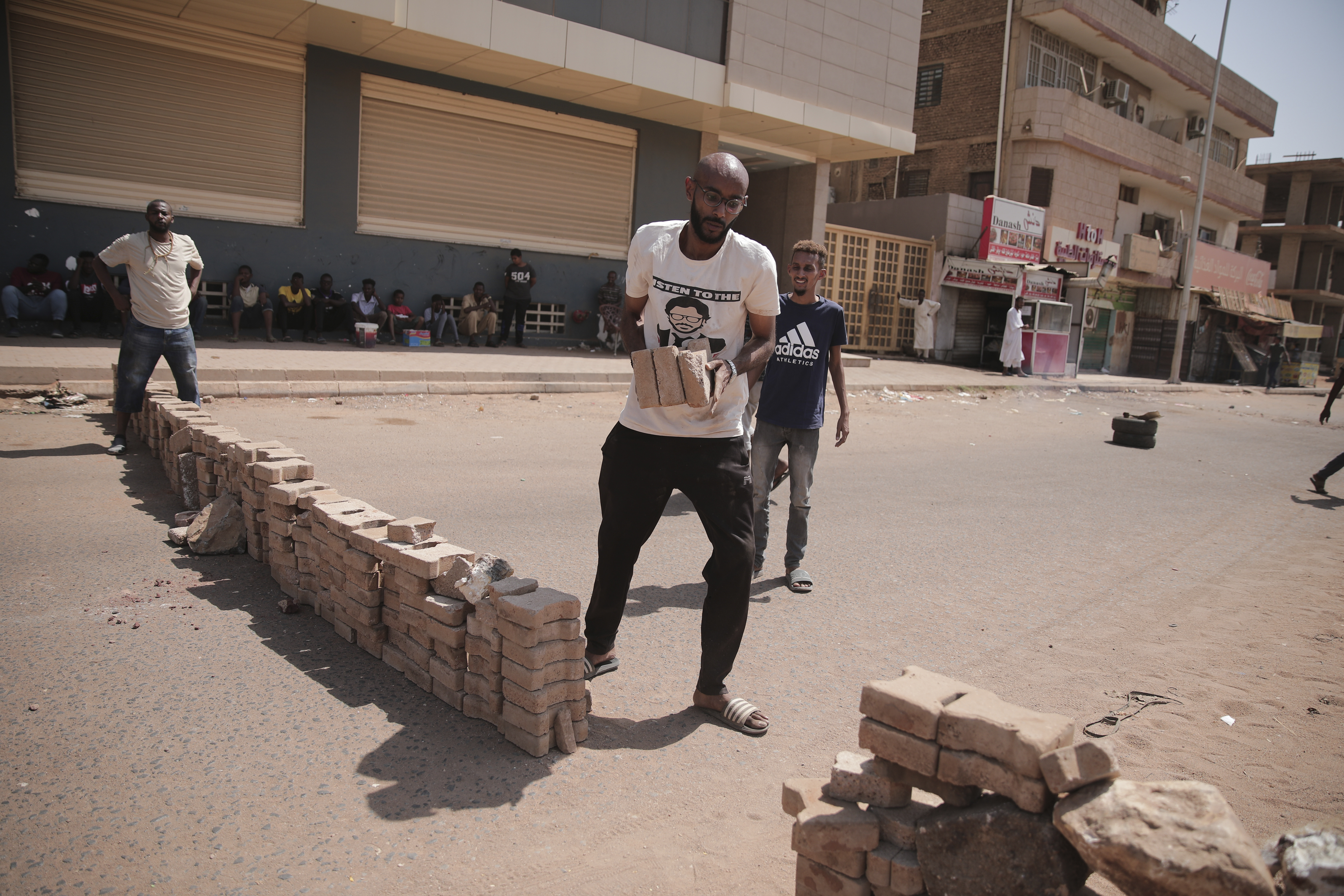 People set up a barricade during a protest in Khartoum, Sudan