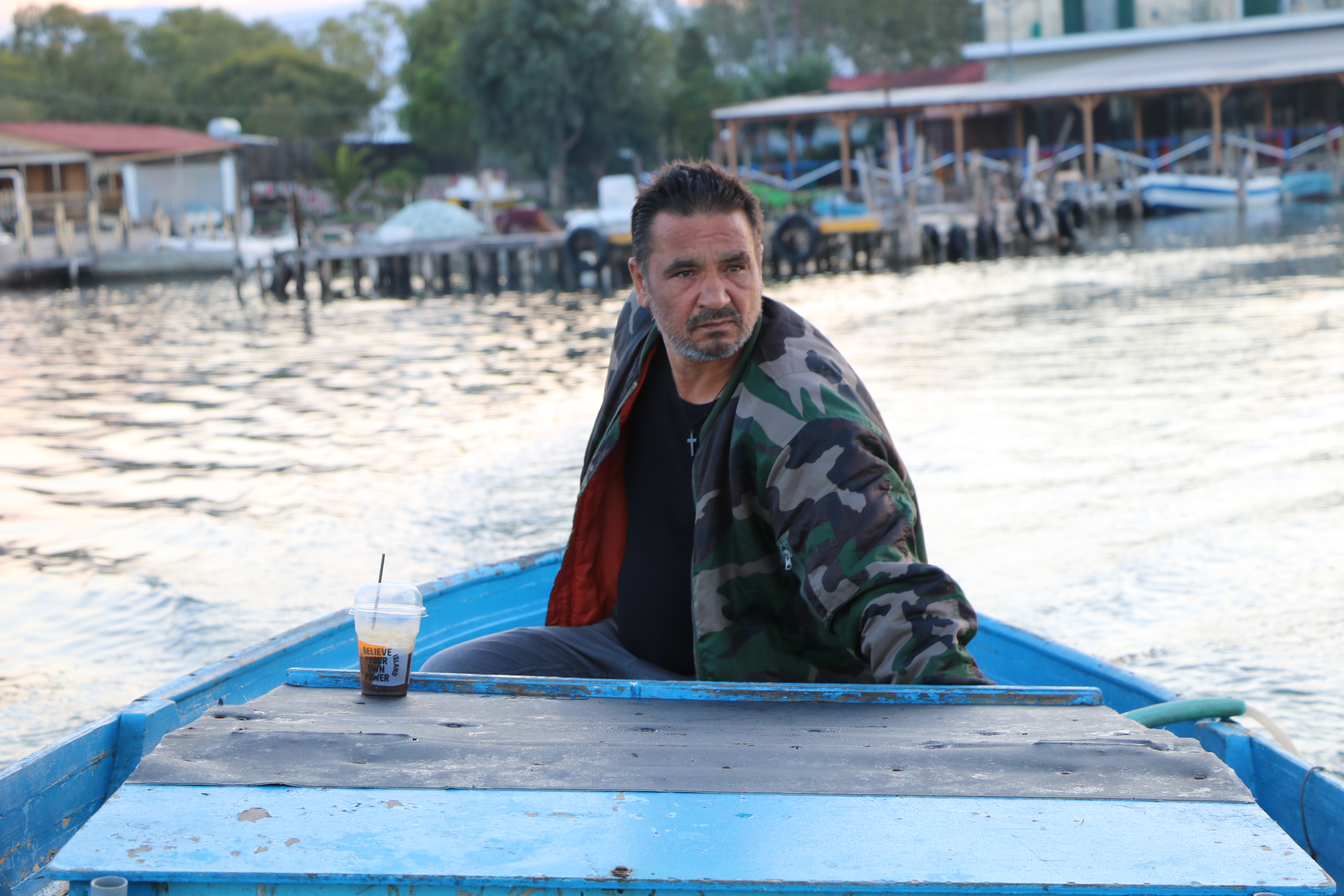 Yiannis Theodoropoulos sets out to visit his fish traps - - by John Psaropoulos
