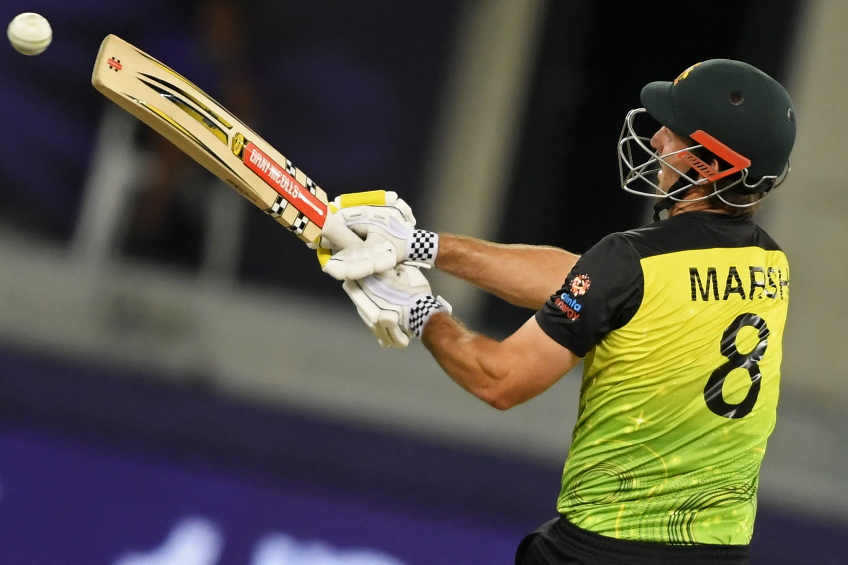 Australia’s Mitchell Marsh plays a shot during the ICC mens Twenty20 World Cup semi-final match between Australia and Pakistan at the Dubai International Cricket Stadium in Dubai on November 11, 2021.