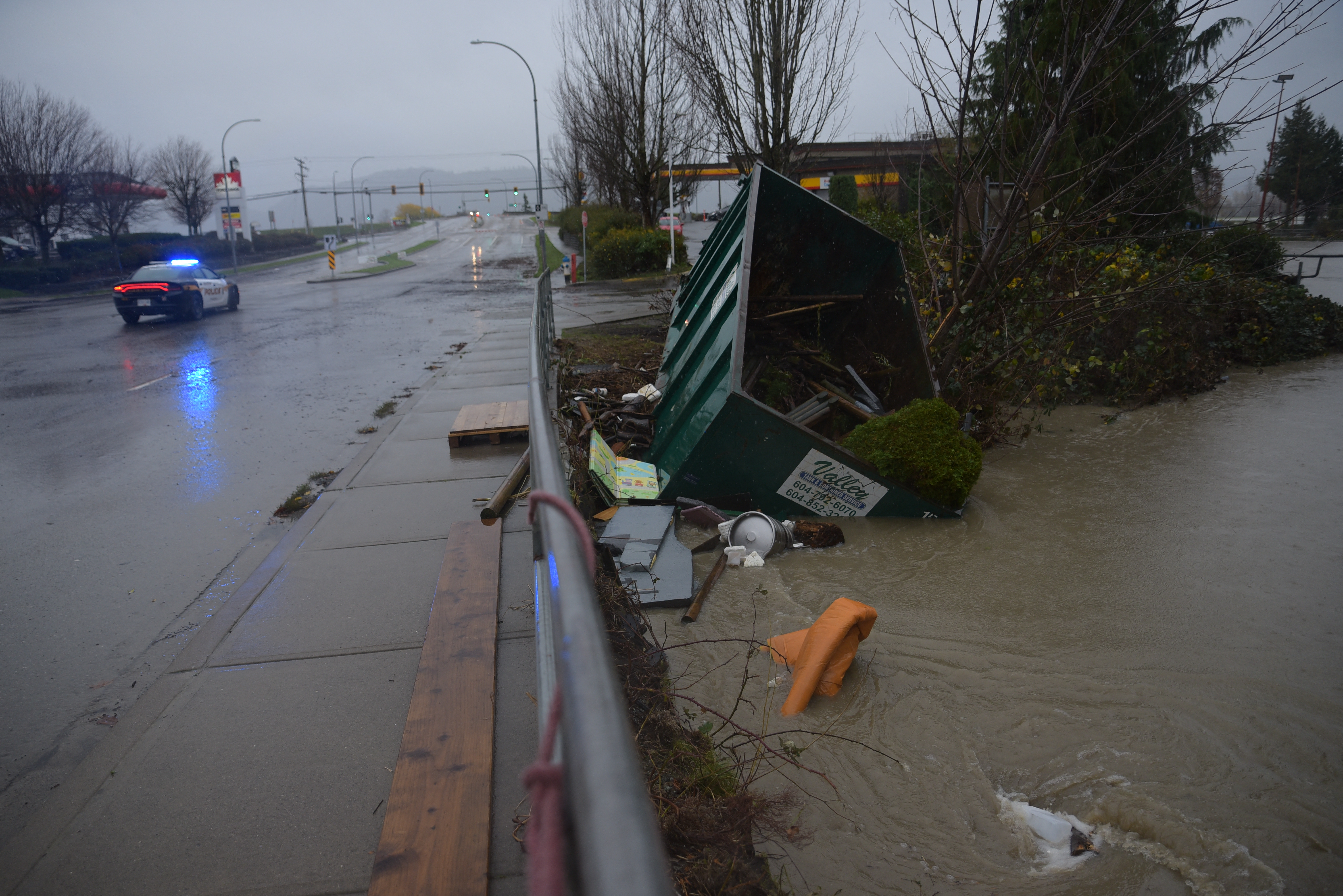 Washout from a previously flooded area is seen near Whatcom Road in Abbotsford, British Columbia on November 18