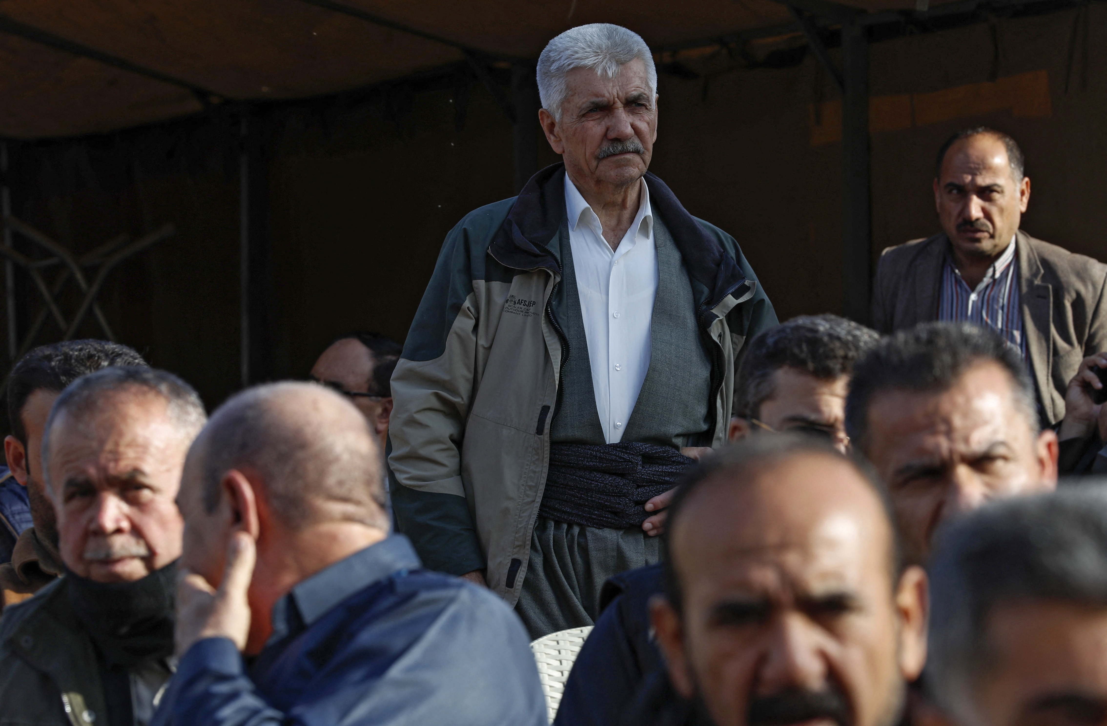 Iraqi Kurd Nuri Hama Amin, the father of Maryam, receives condolences in Soran, Iraq