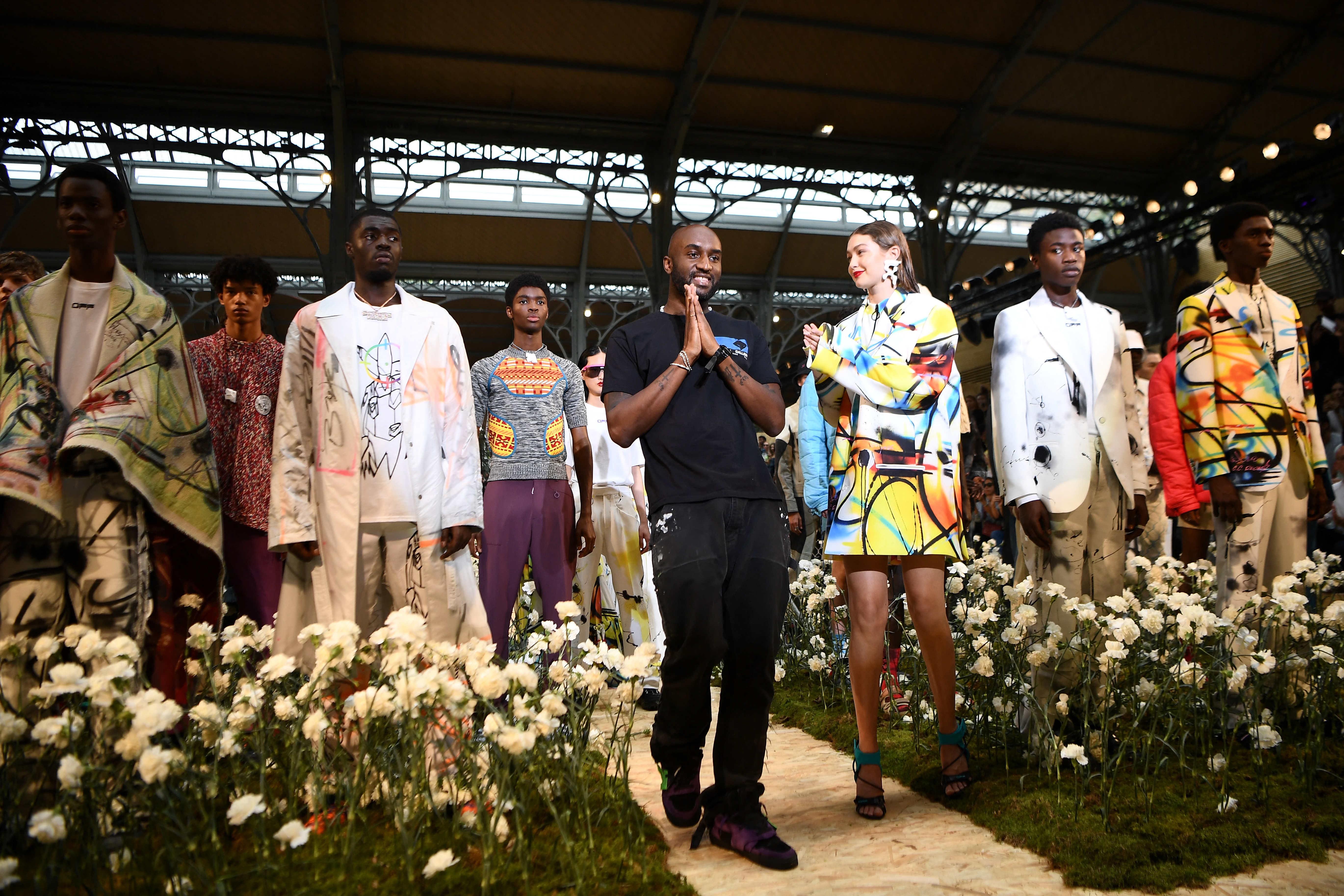 Virgil Abloh acknowledged the audience at the end of an Off-White show in Paris. Abloh, who found inspiration in hip hop, graffiti and skateboard culture, was renowned for marrying streetwear with luxury fashion