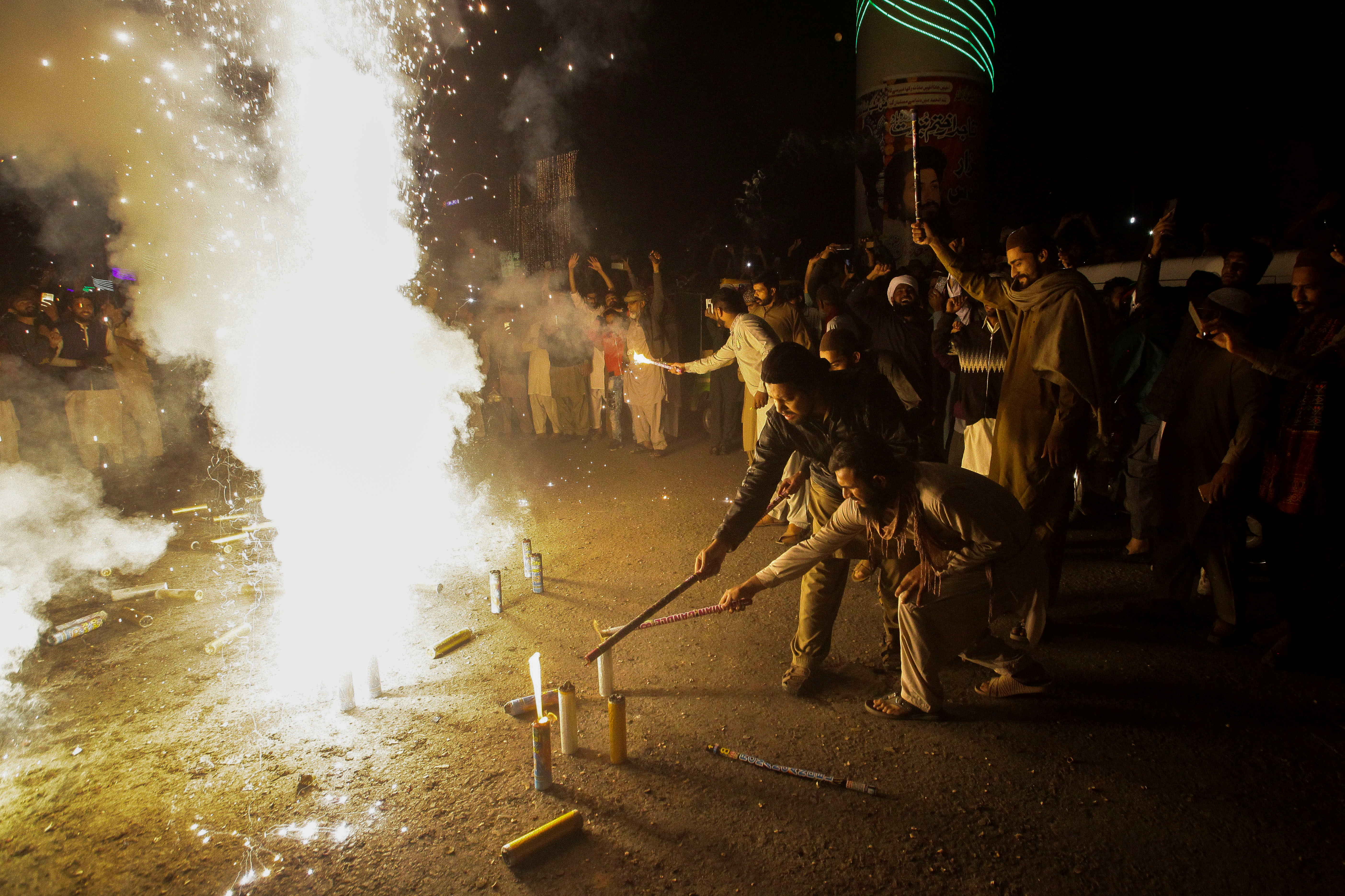 TLP supporters light fireworks as they celebrate the release of their leader Saad Rizvi