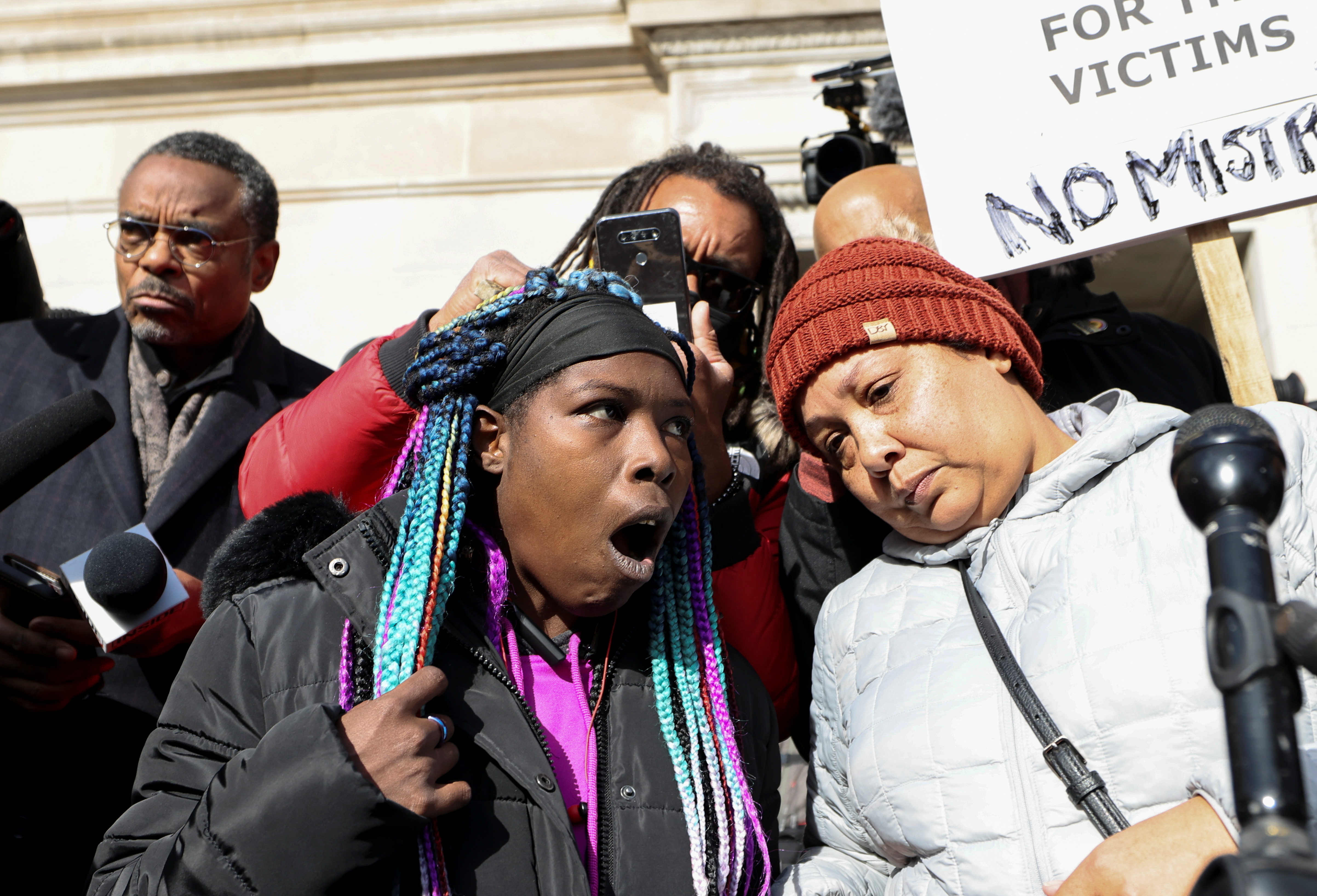 People react to the verdict in the trial of Kyle Rittenhouse outside the Kenosha County Courthouse, Kenosha, Wisconsin, US, November 19, 2021