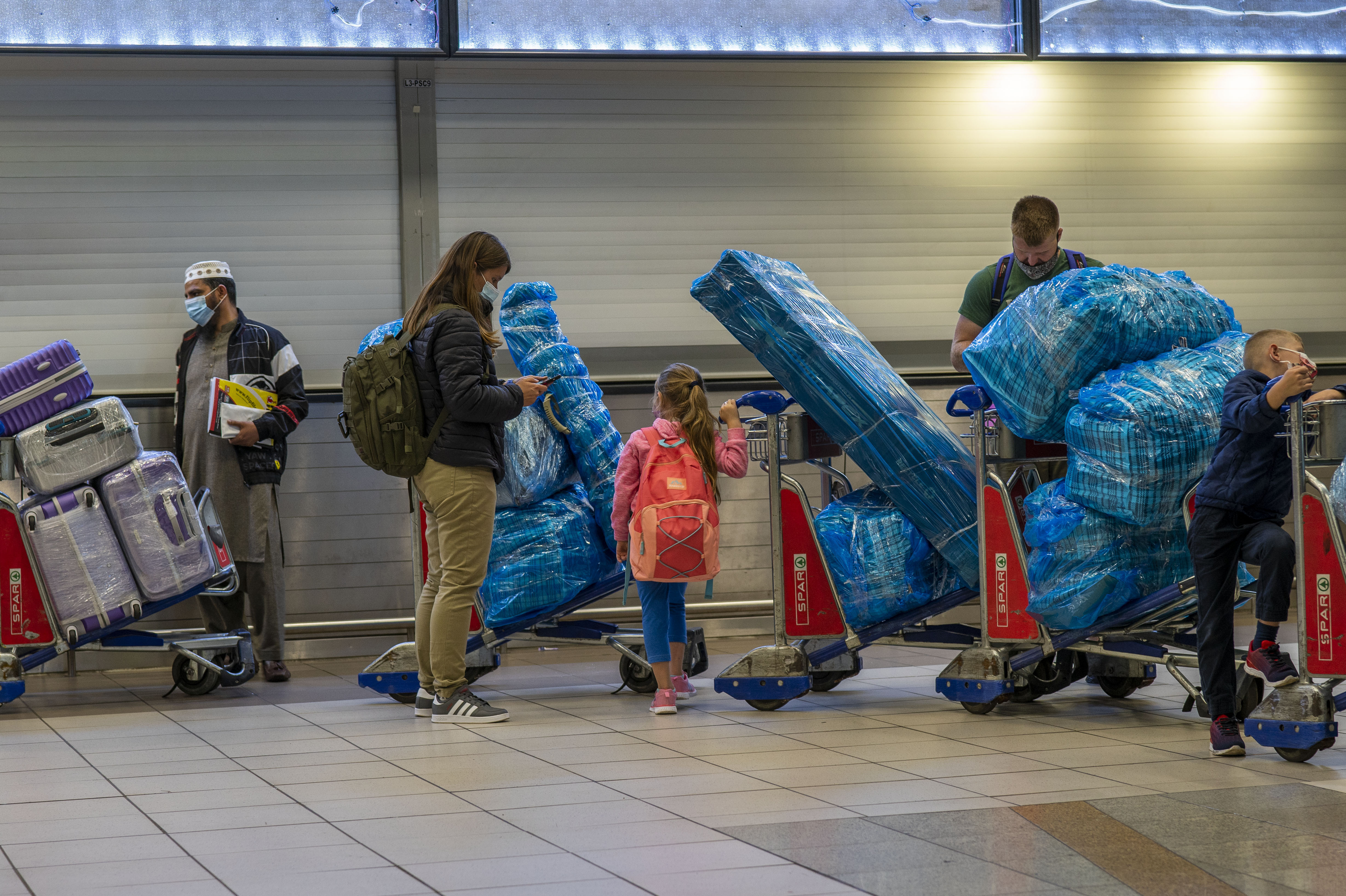 A slew of nations moved to stop air travel from southern Africa in reaction to news of a new COVID-19 variant that has been detected in South Africa