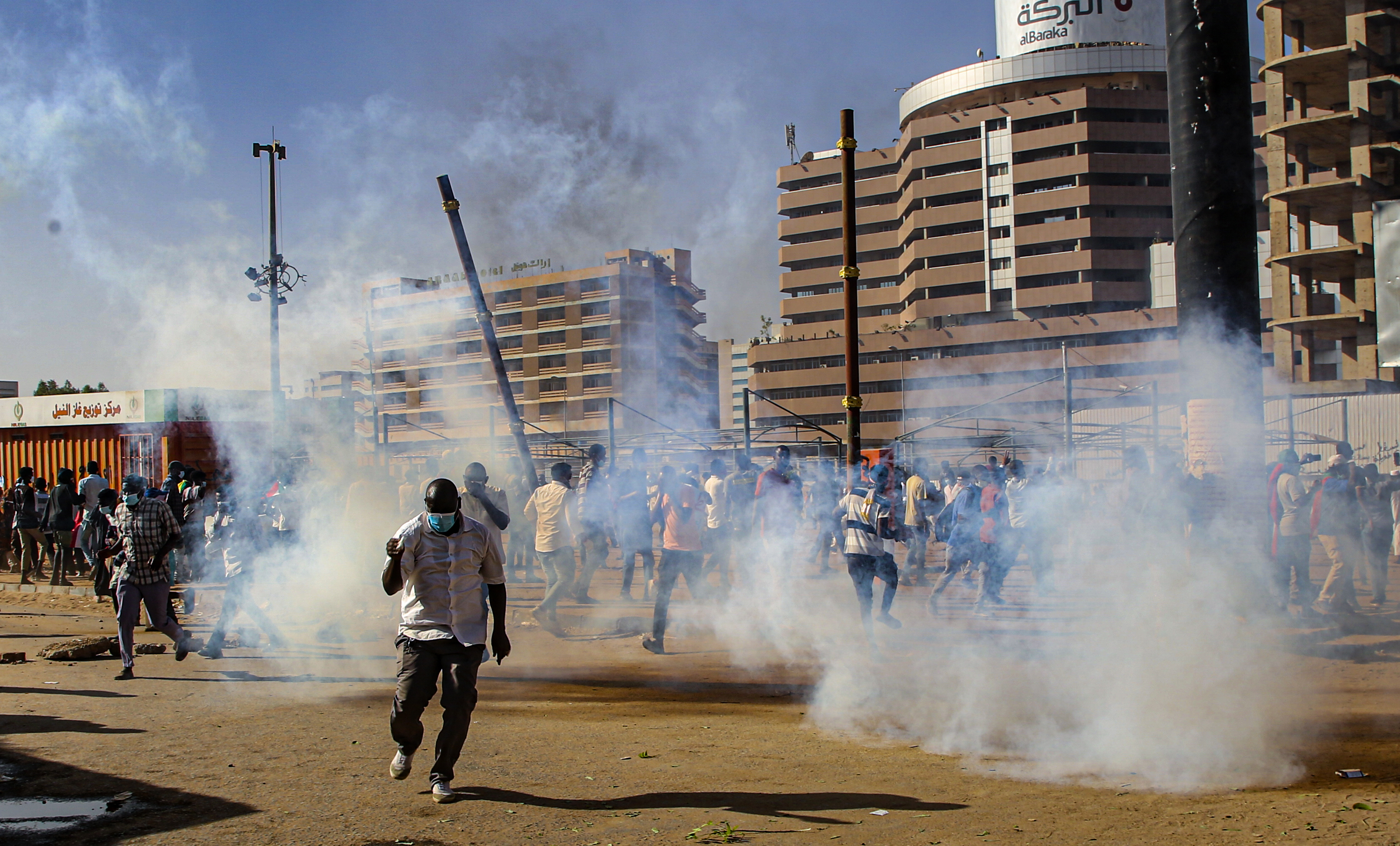 Sudan security forces fire tear gas to disperse anti-coup protesters during a demonstration in Khartoum, Sudan on November 30 2021. Thousands of protesters rallied against a deal reinstating the prime minister after his ouster in a military coup last month