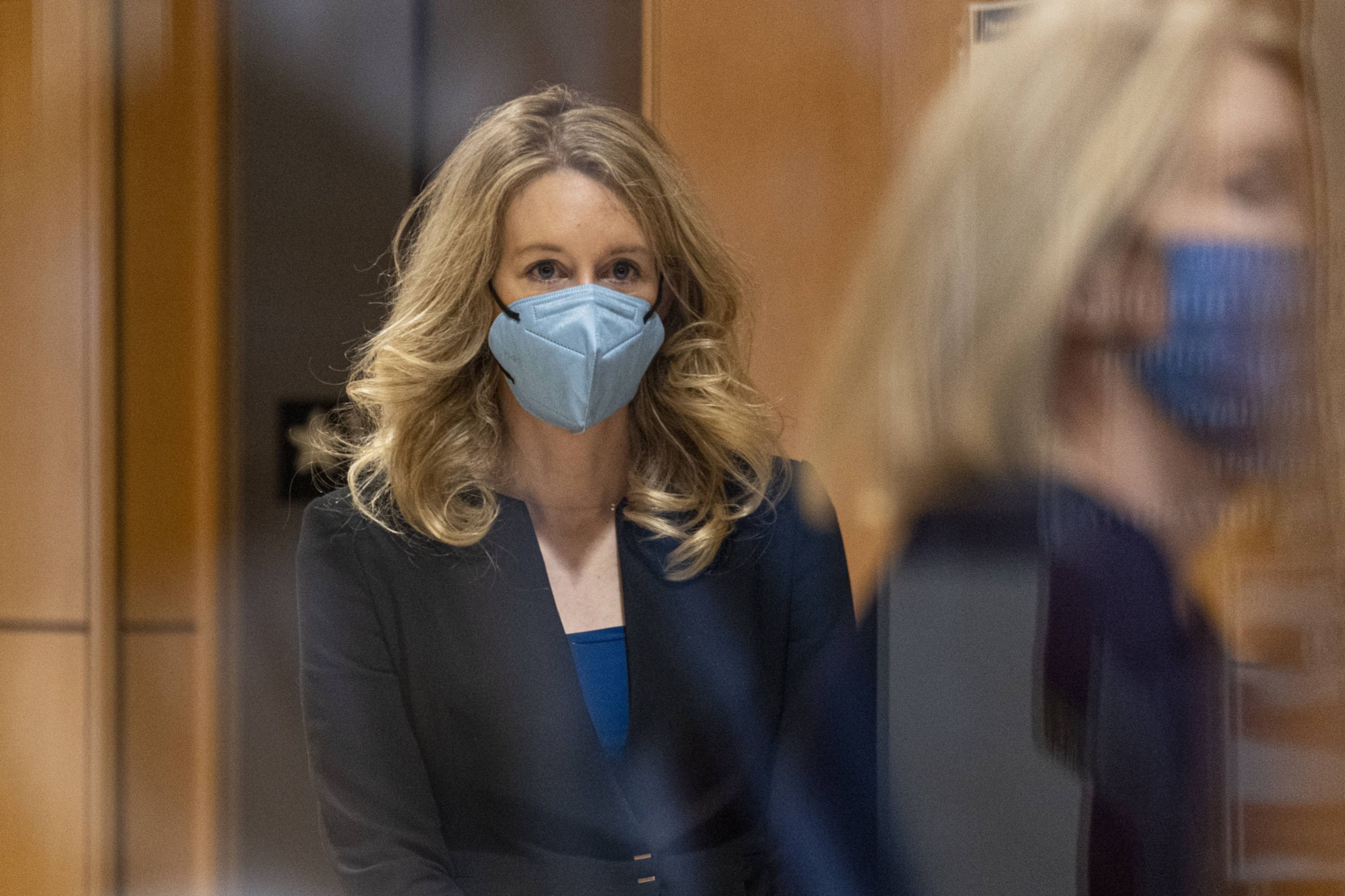 Theranos founder Elizabeth Holmes arrives at federal court in San Jose, California, on November 22