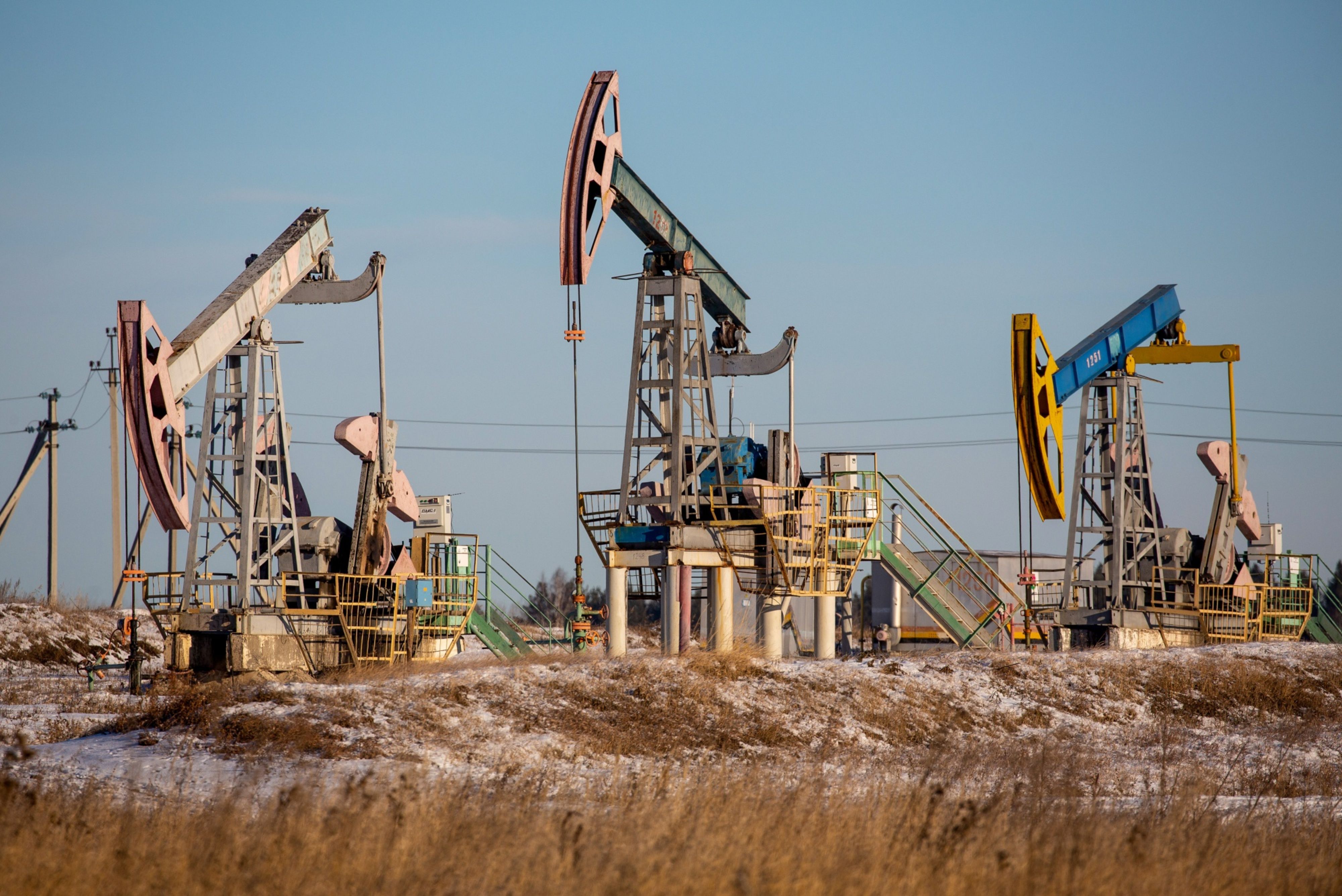 Oil pumping jacks, also known as “nodding donkeys”, in an oilfield near Dyurtyuli, in the Republic of Bashkortostan, Russia, on Thursday, November 19, 2020