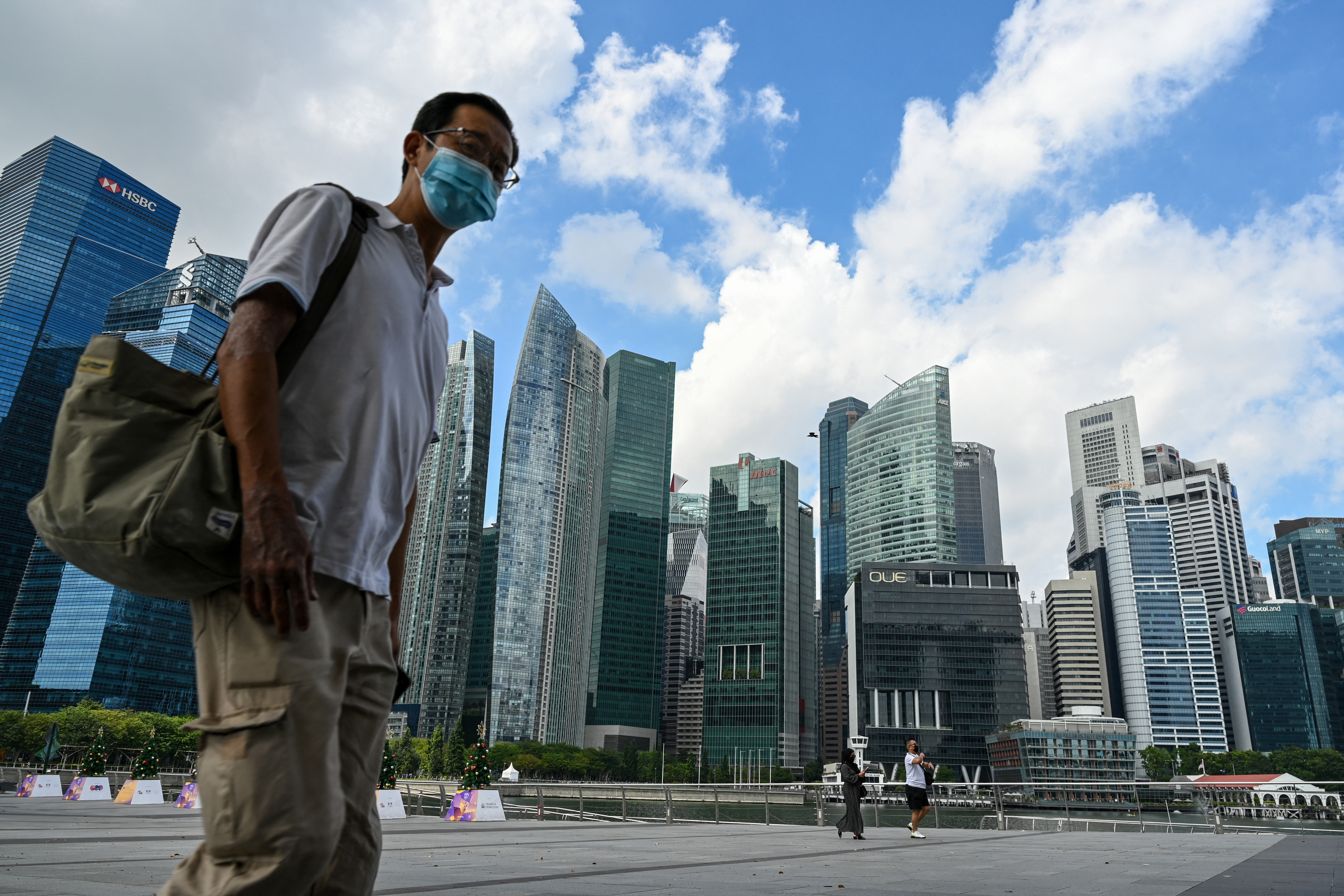 Singapore is trying to balance public health with reopening its economy and borders