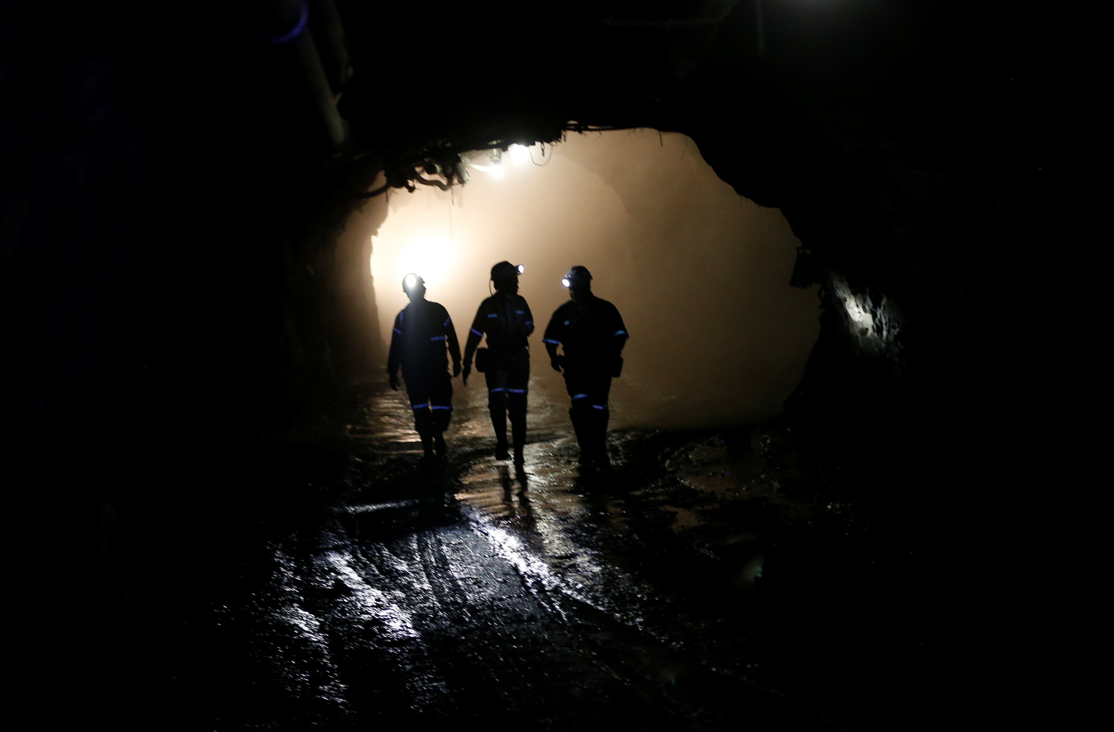 Mine workers are seen under ground at Cullinan mine, near Pretoria, South Africa, February 1, 2019. [FILE: Siphiwe Sibeko/Reuters]
