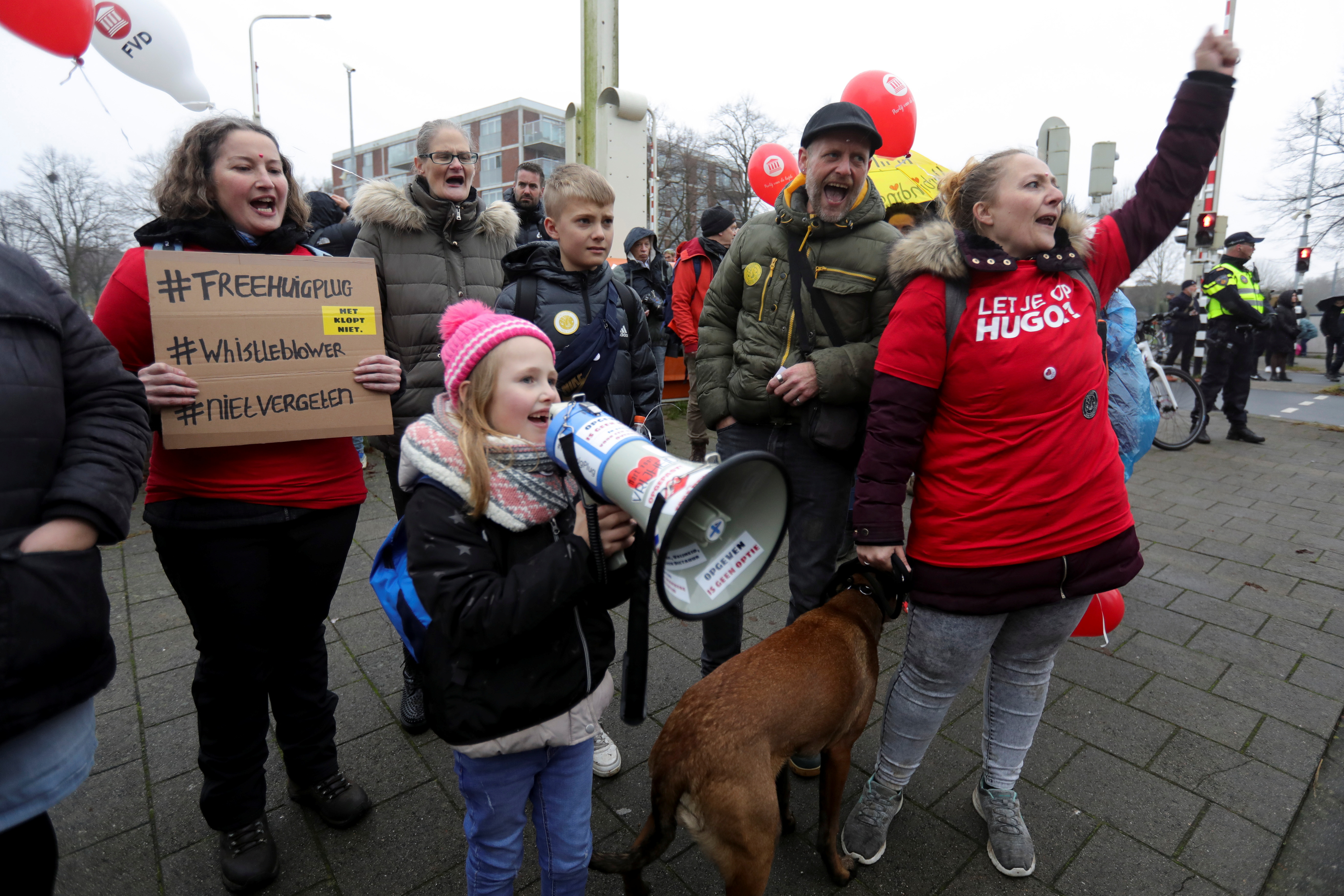 People protest against new measures to fight a surge of coronavirus disease in Utrecht