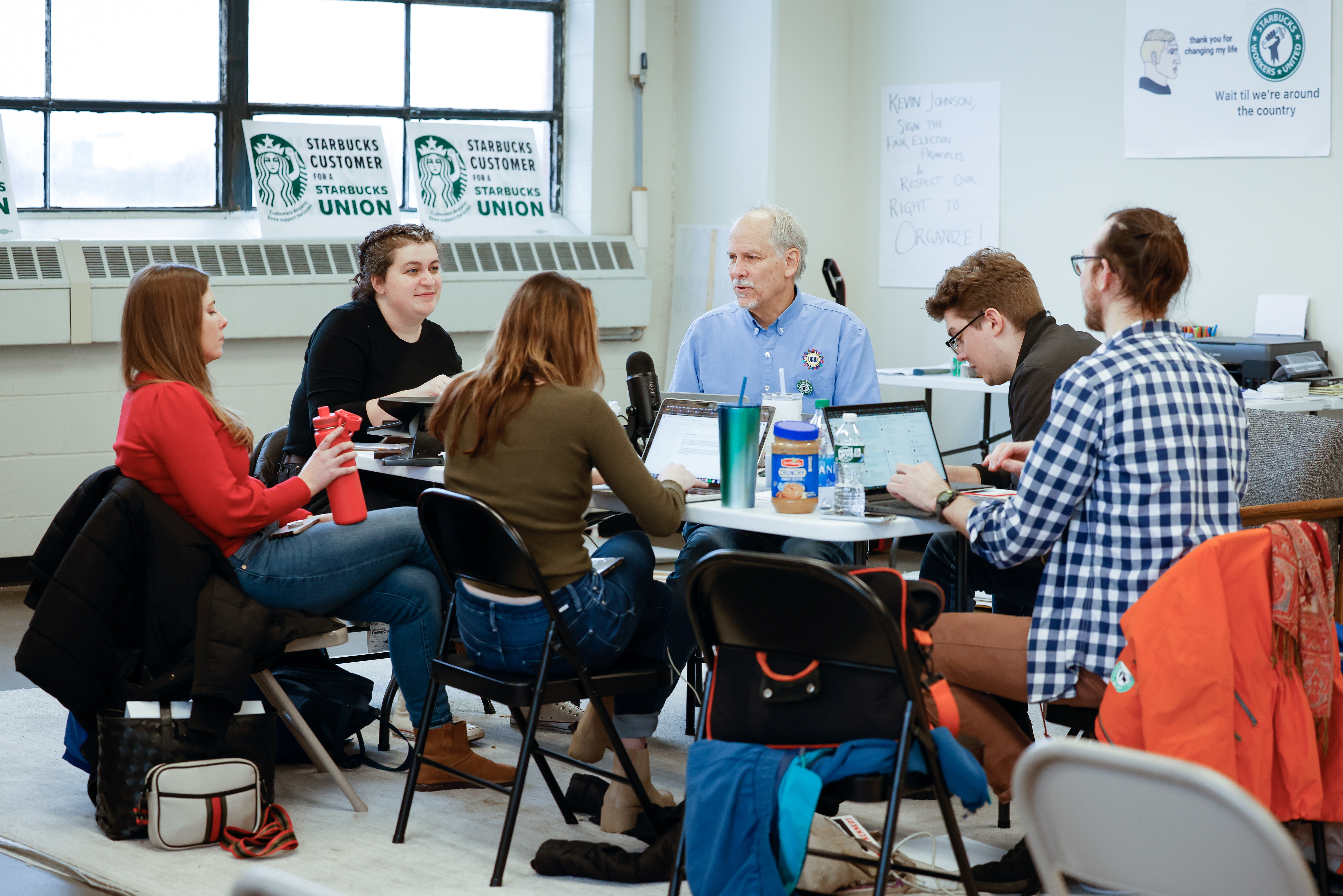 Starbucks Workers United members meet at their office in Buffalo, New York, on December 7, 2021