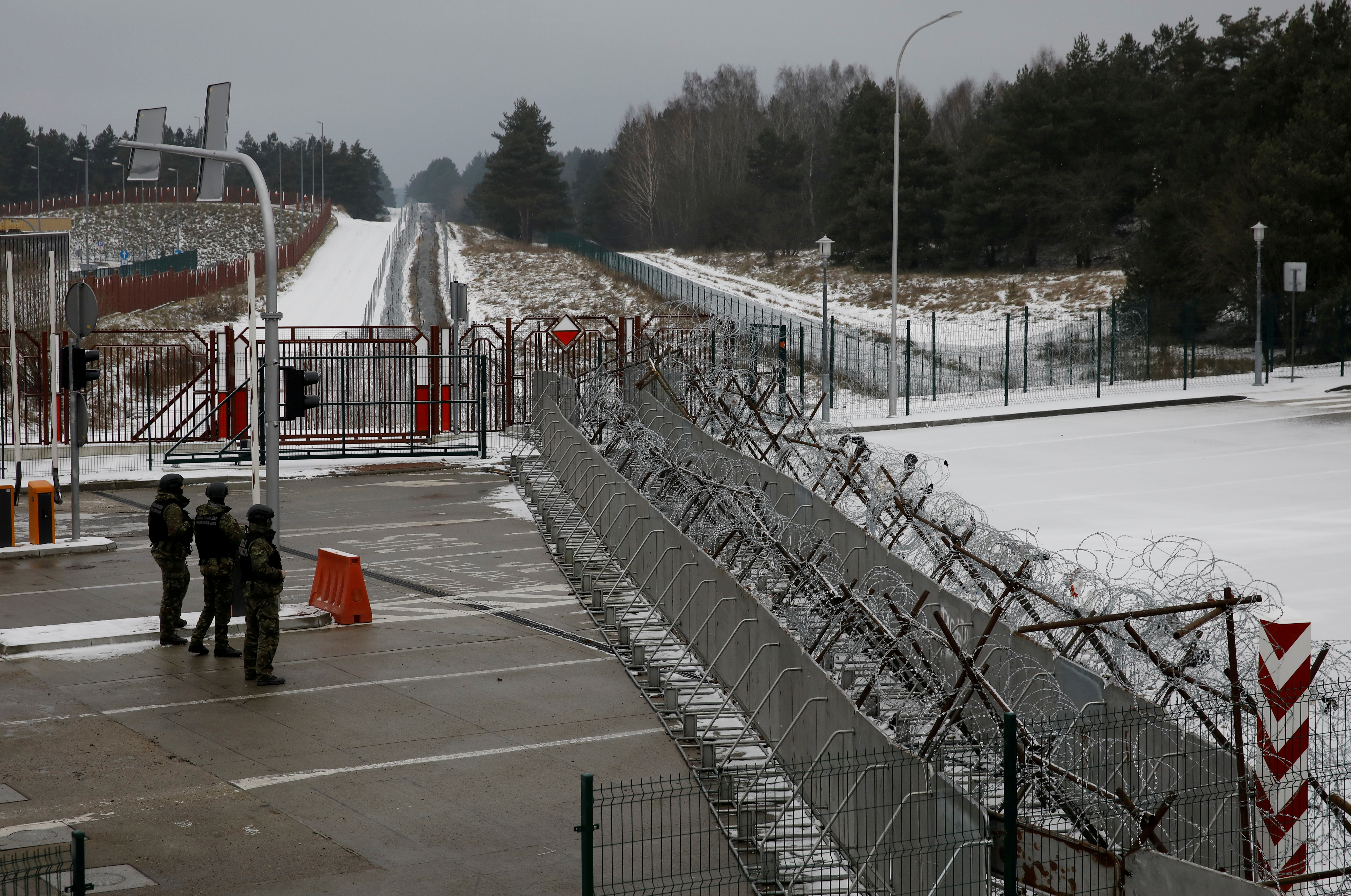 Polish border guards on patrol at the Kuznica-Bruzgi checkpoint on the Polish-Belarusian border amid the refugee crisis, in Kuznica, Poland, on December 6, 2021