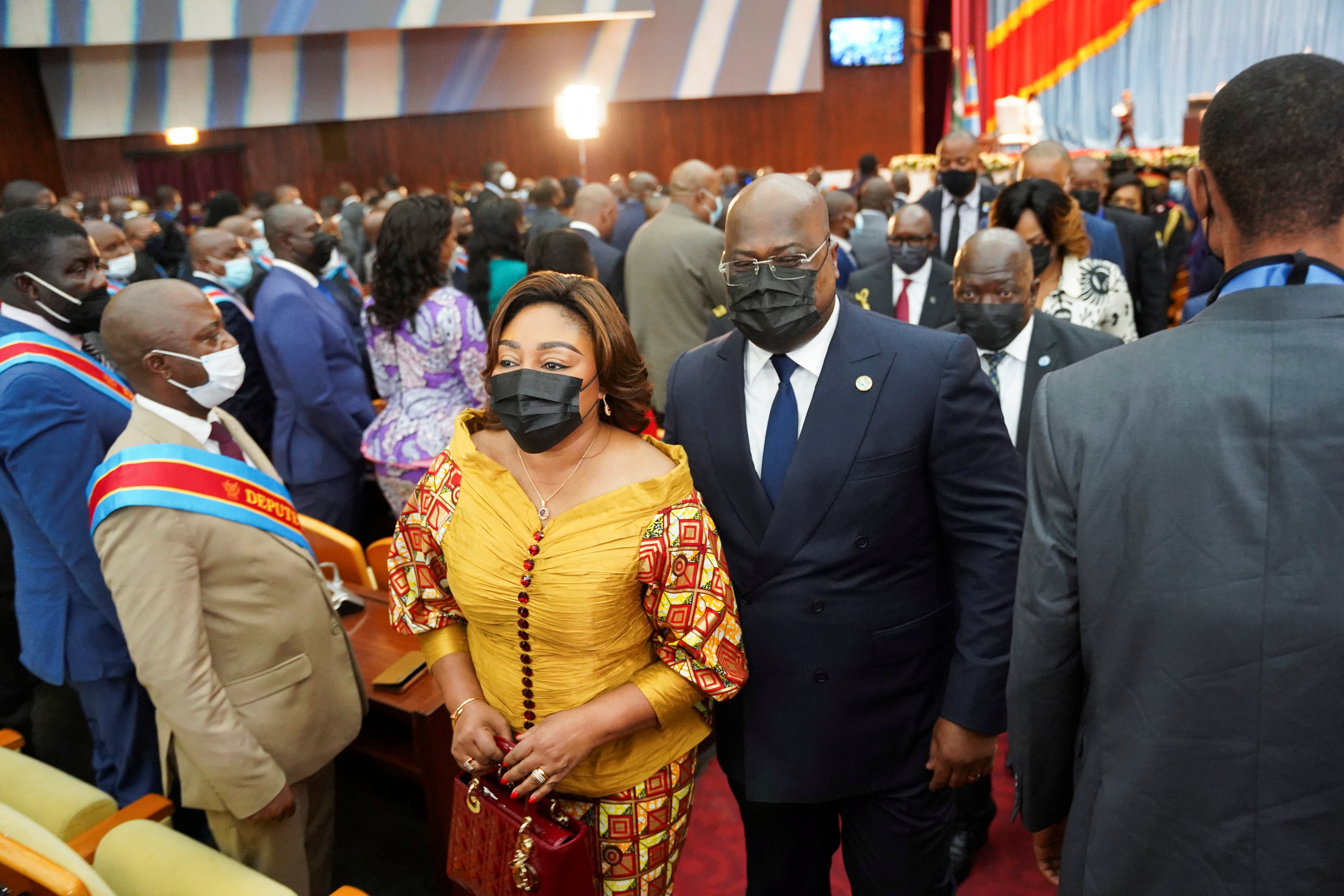 DRC President Felix Tshisekedi walks out with his wife Denise Nyakeru Tshisekedi after his annual State of the Nation address during a joint session of parliament in Kinshasa, DRC, December 13, 2021