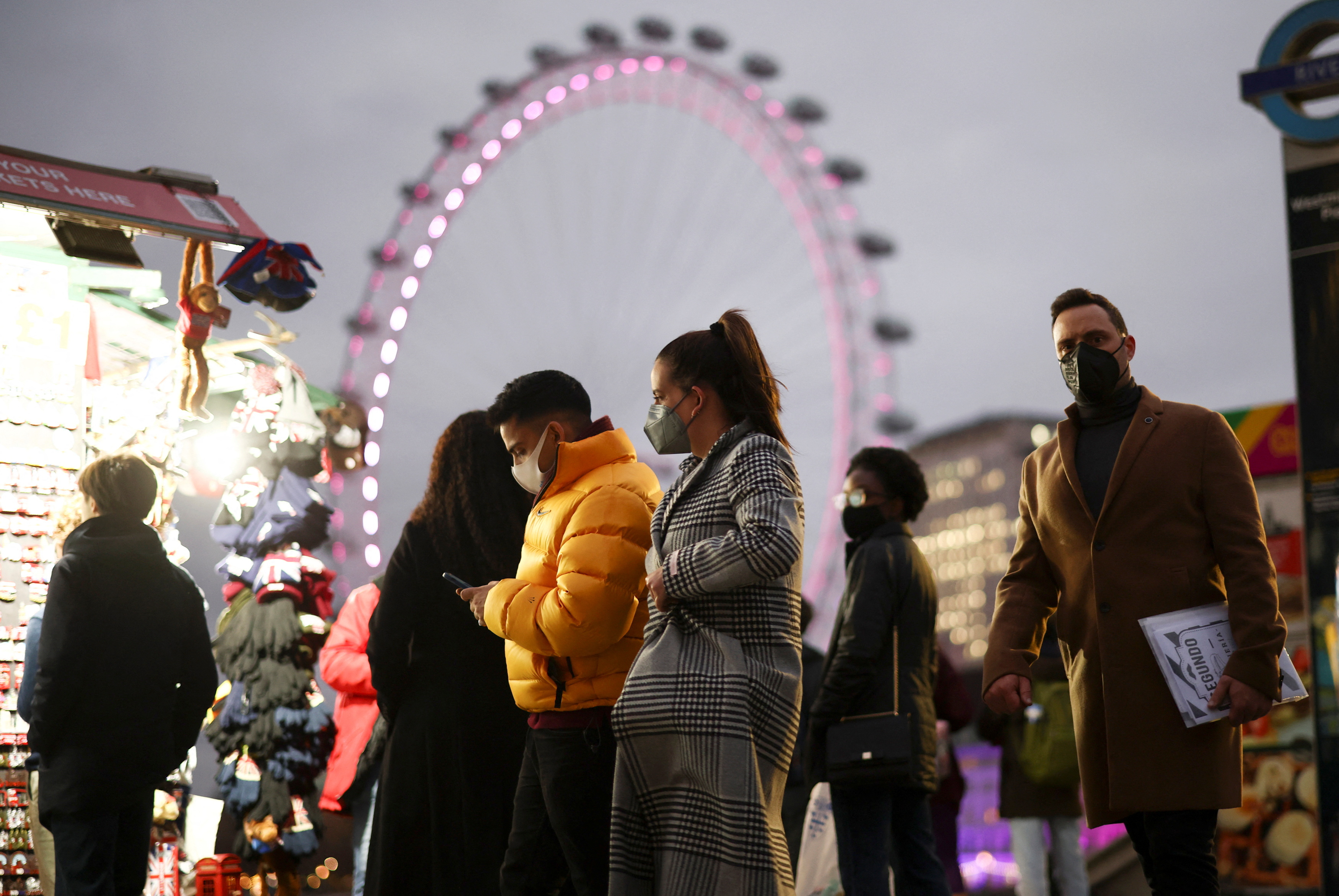 People walk across Westminster Bridge, amid the coronavirus disease (COVID-19) outbreak in London, UK