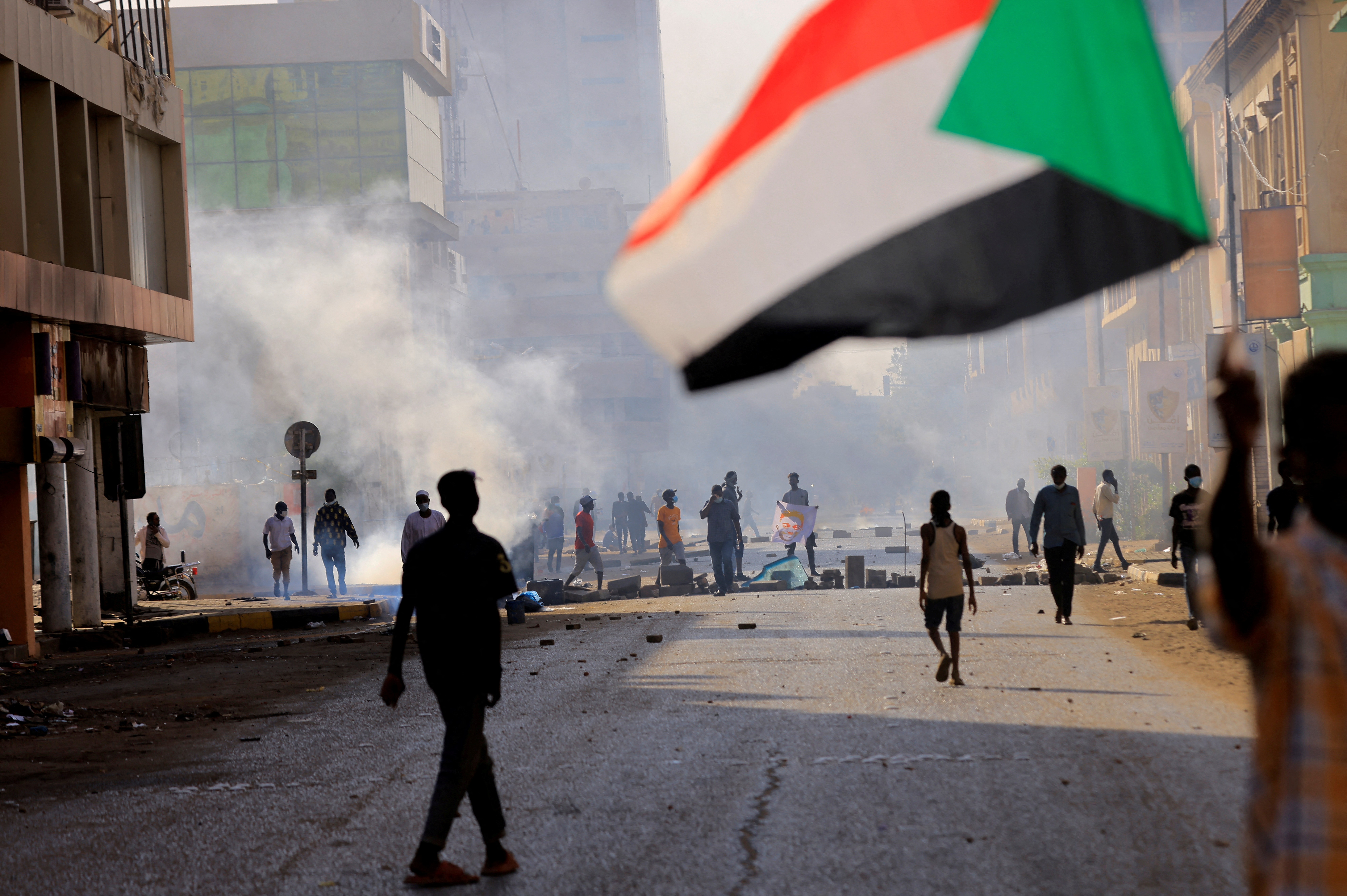 People march to the presidential palace, in Khartoum, Sudan