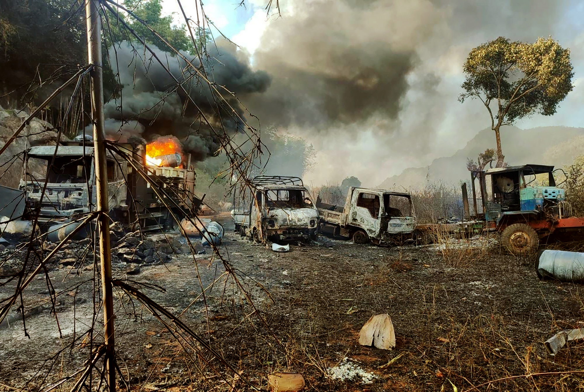 On Christmas Eve, the Myanmar military was accused of rounding up villagers, shooting dead more than 30 people and burning their bodies in an attack in the east of the country [Karenni Nationalities Defence Force via AP Photo]
