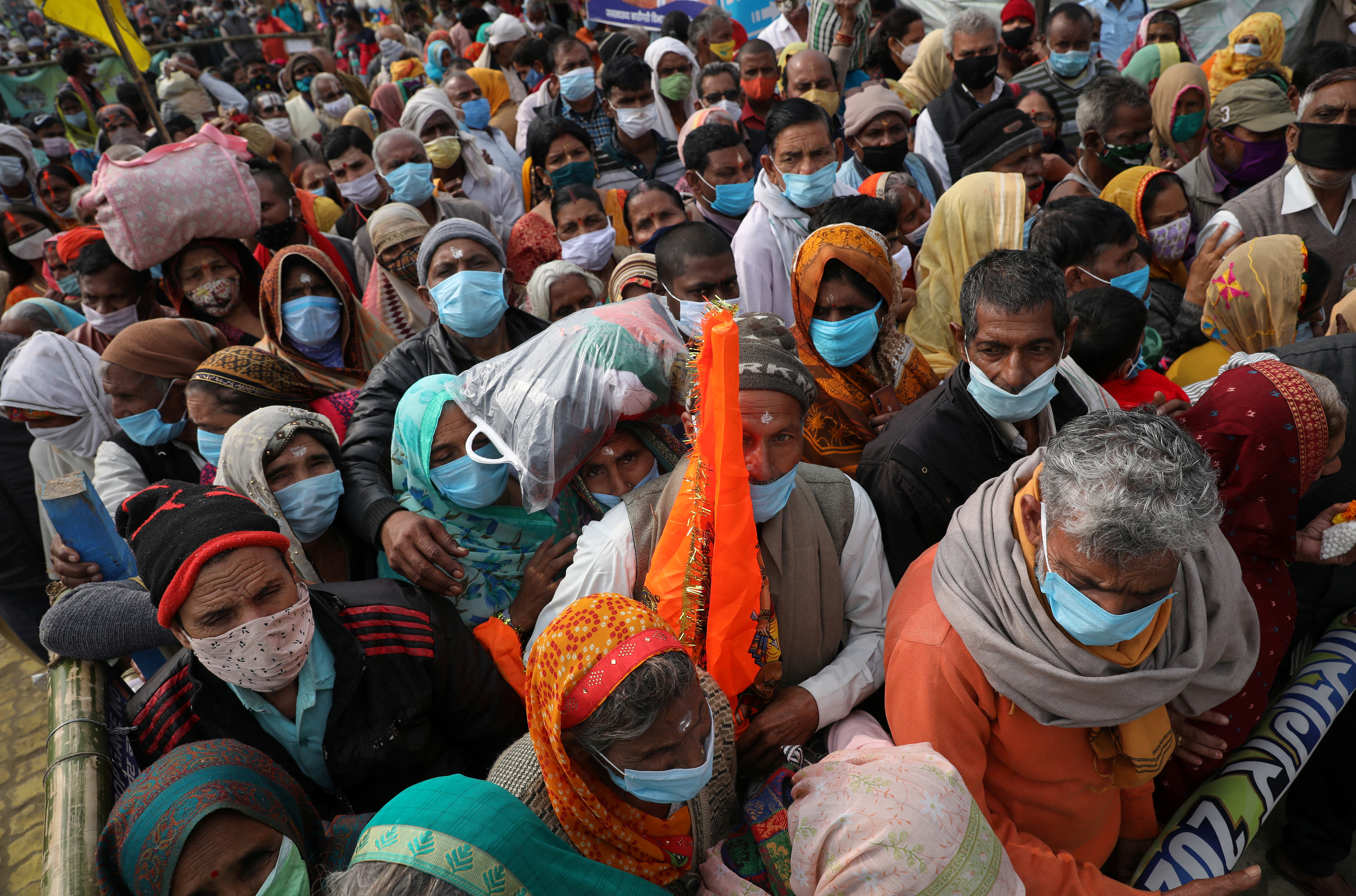 Hindu pilgrims arrive at the confluence of the Ganges River and the Bay of Bengal, before Makar Sankranti festival, in the eastern state of West Bengal