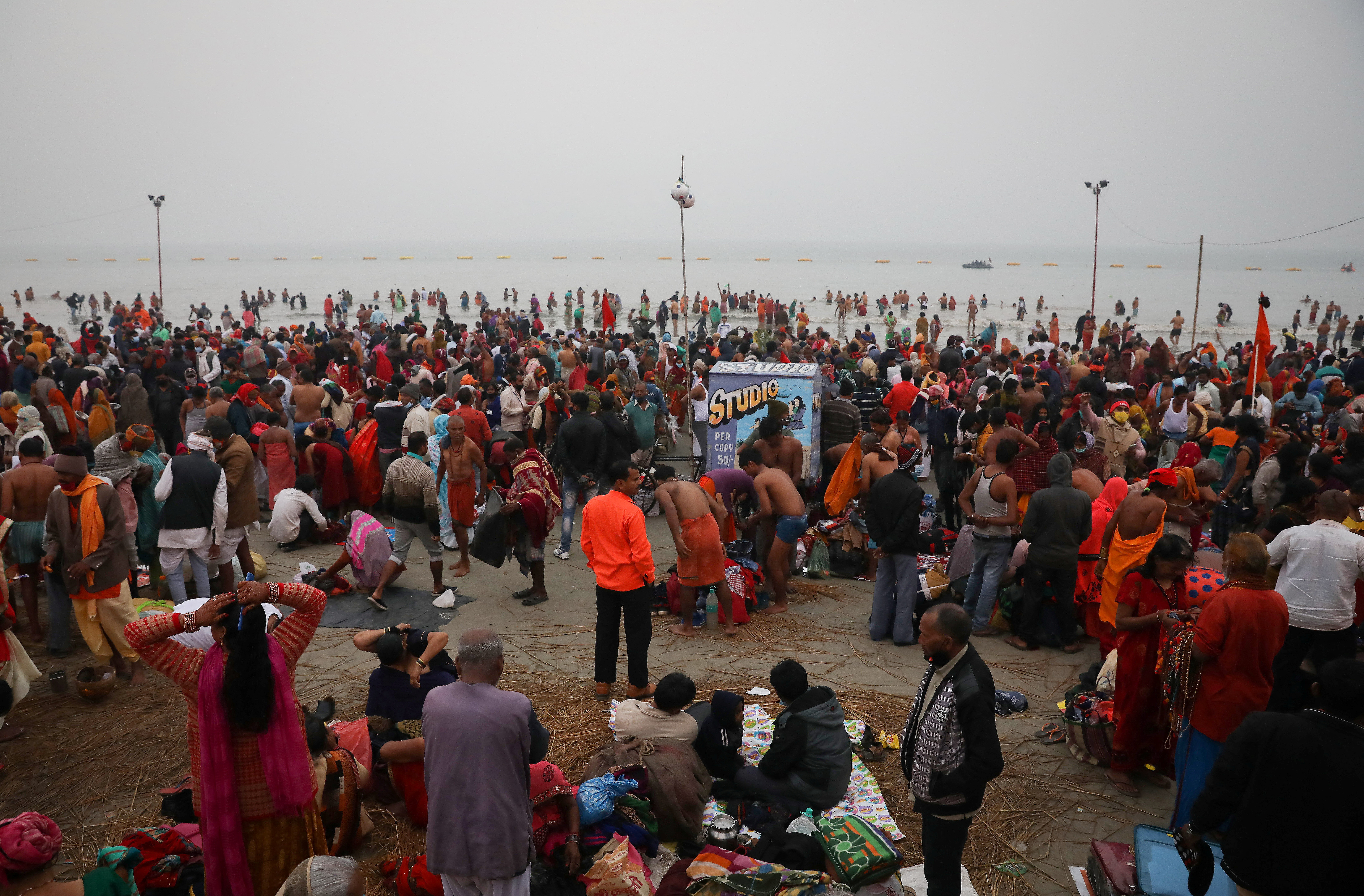 Hindu pilgrims gather to take a dip at the confluence of the river Ganges and the Bay of Bengal, on the occasion of “Makar Sankranti” festival at Sagar Island
