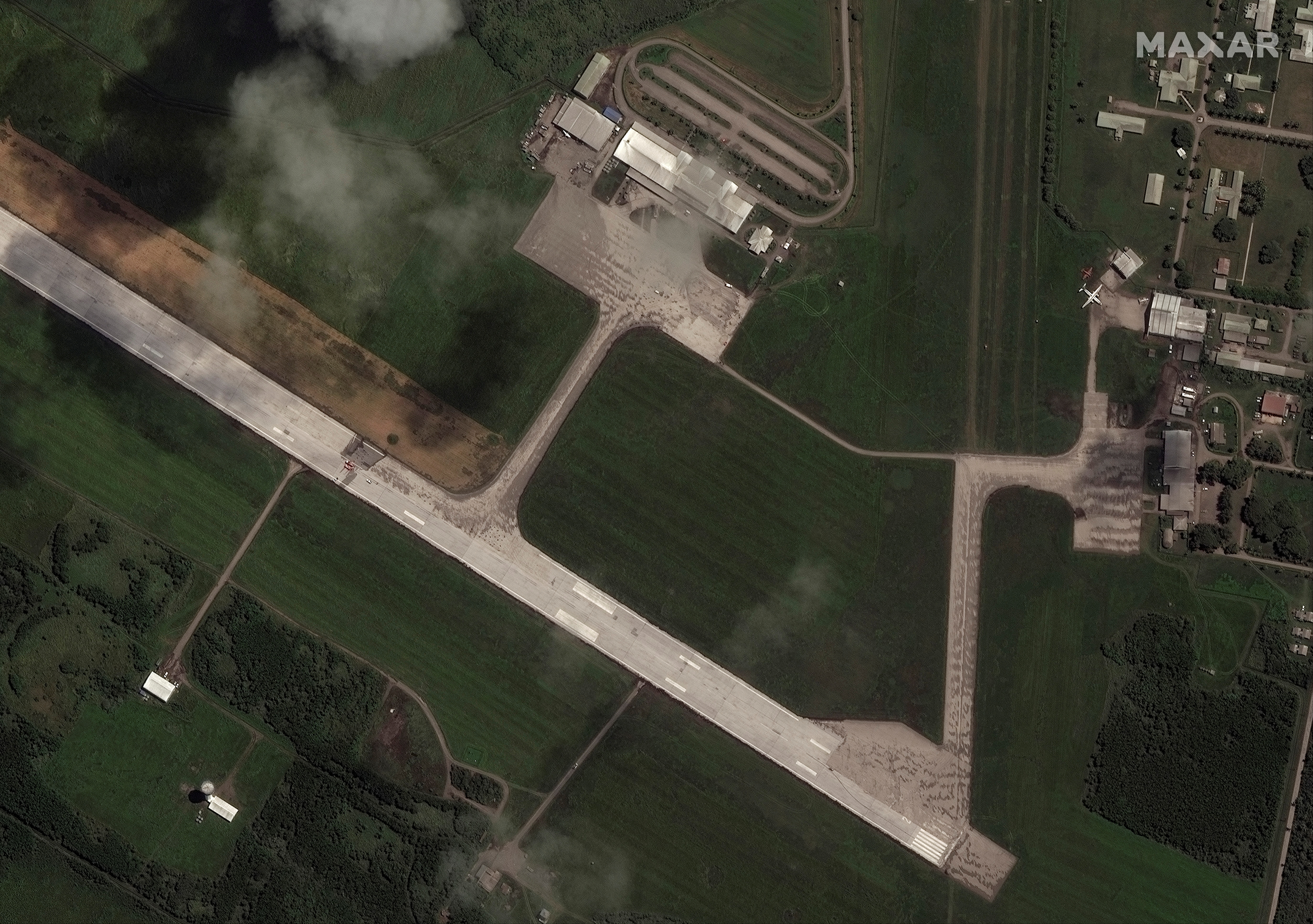 The main runway of the Fua'amotu International Airport is partially blocked due to volcanic ash.