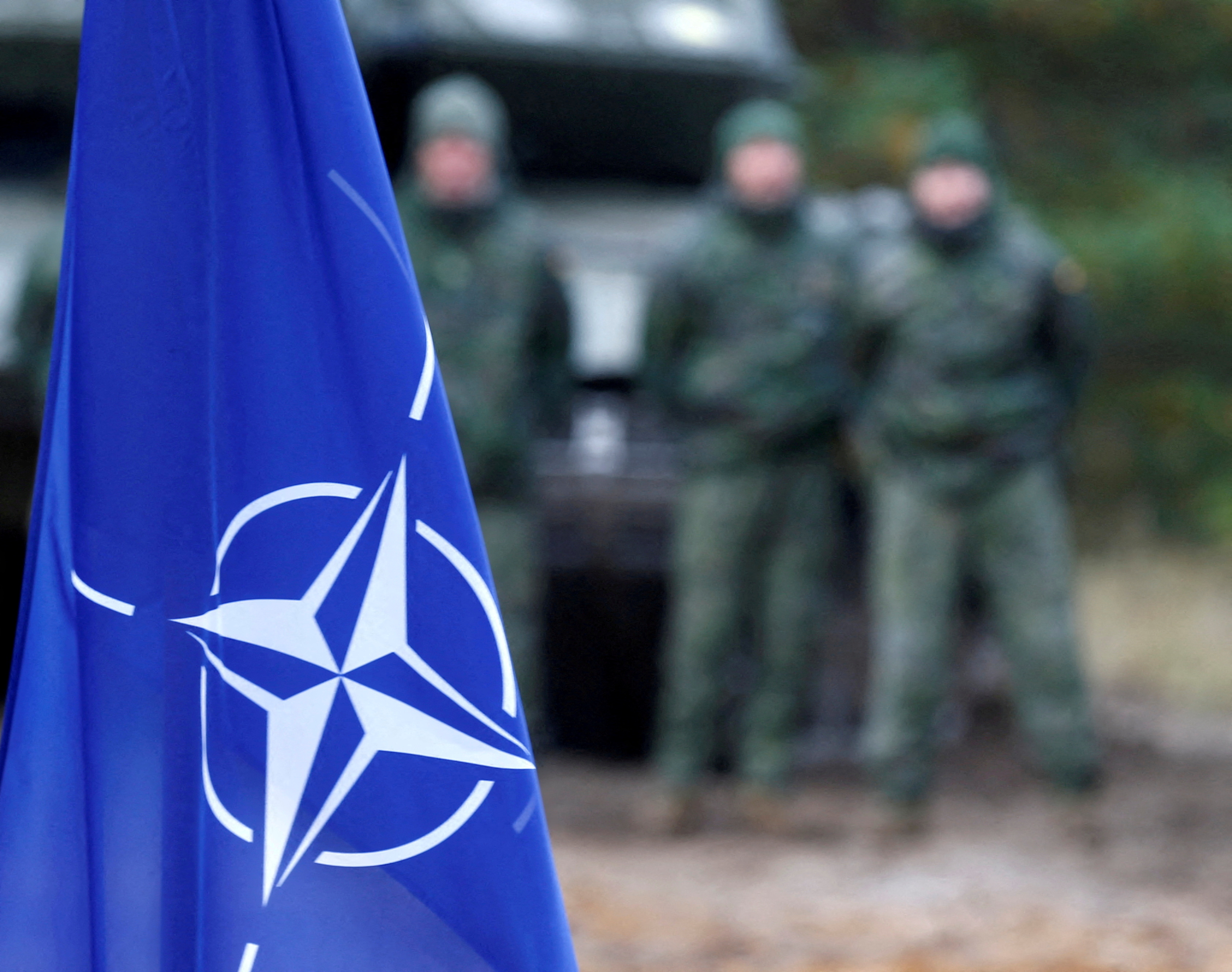 NATO flag is seen during NATO enhanced Forward Presence battle group military exercise Silver Arrow in Adazi, Latvia October 5, 2019.