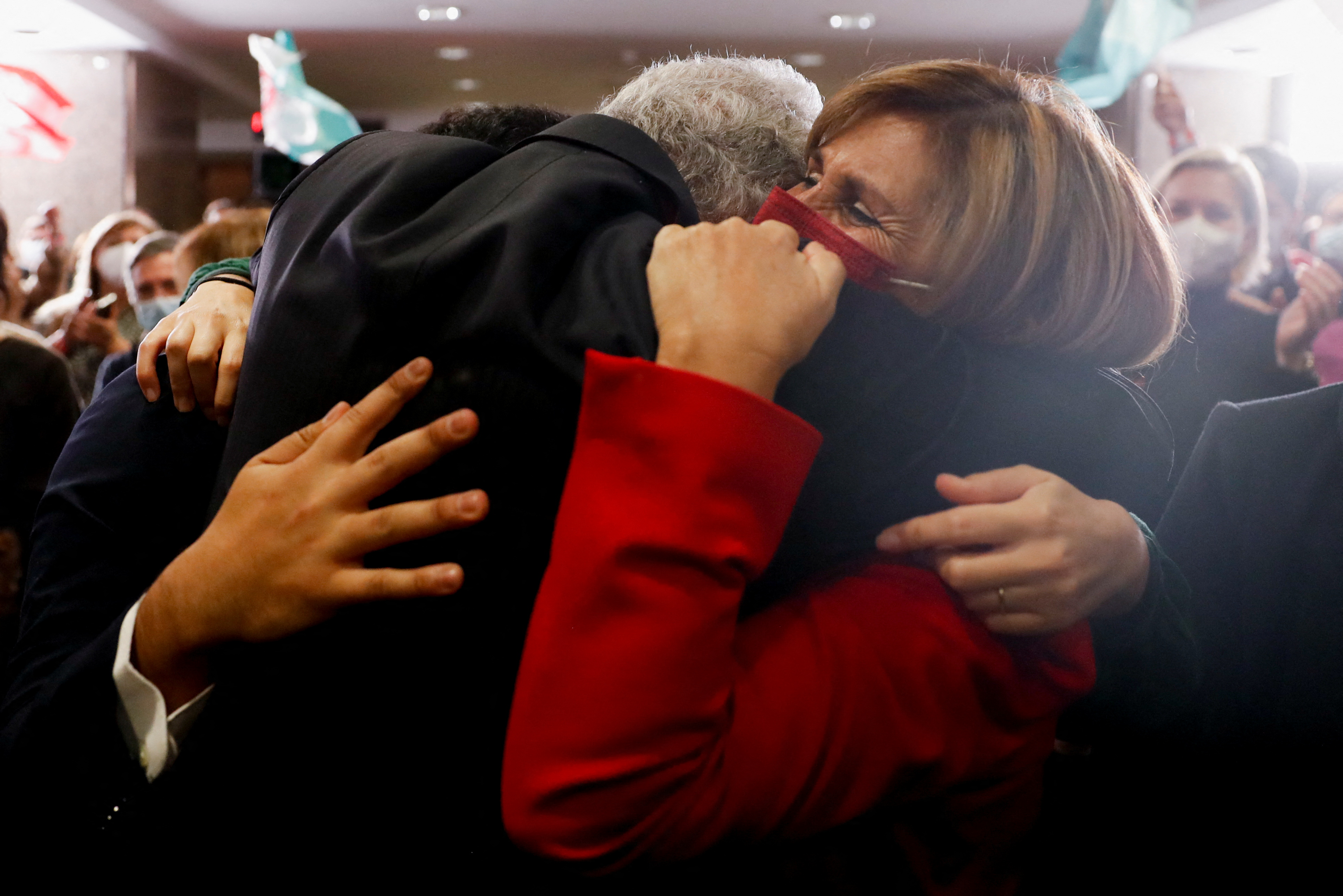 Prime Minister and Socialist Party Leader Antonio Costa hugs his wife, Fernanda Tadeu, after winning the general election in Portugal