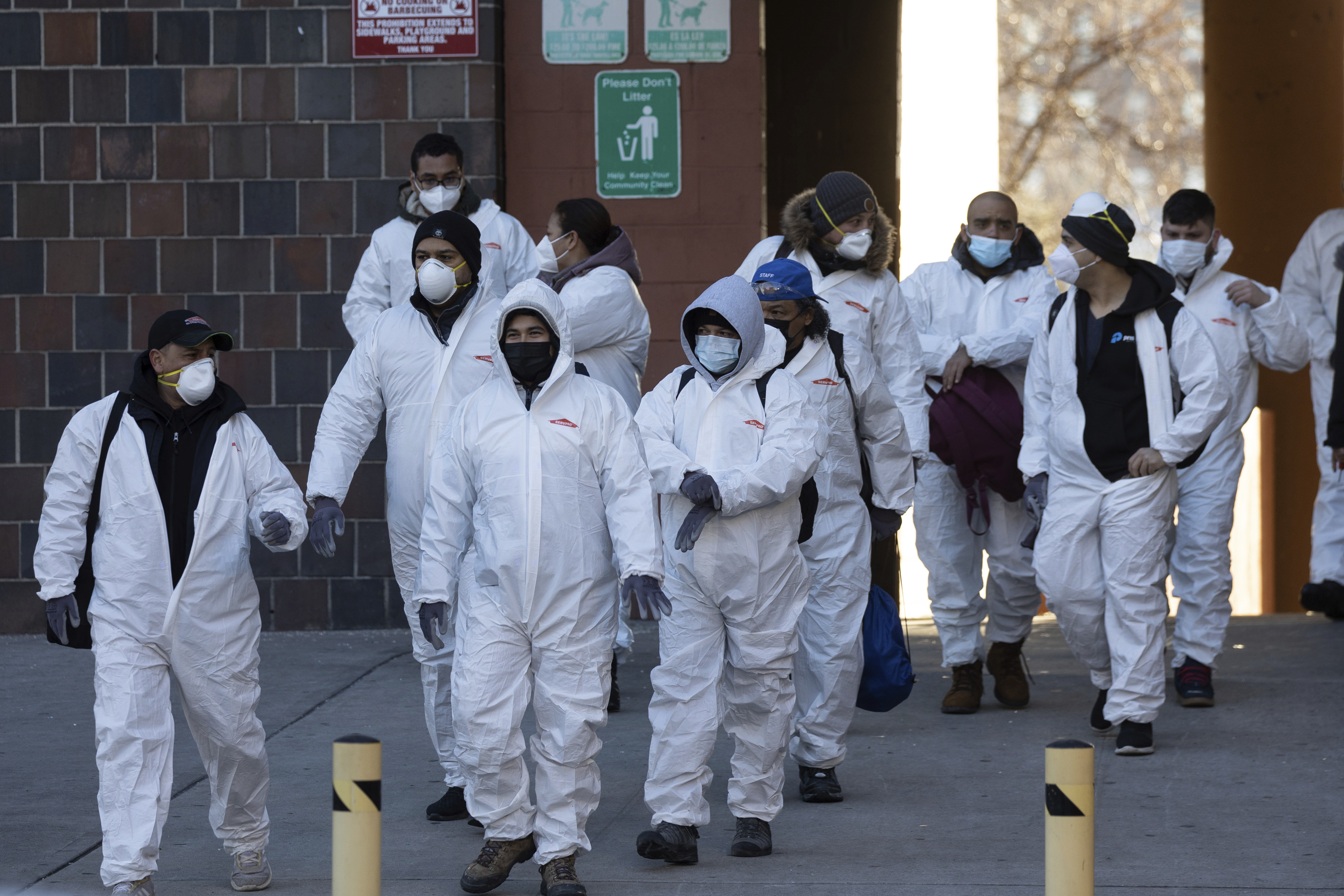 Cleaning and recovery crews in hazmat suits arrived on Monday to help