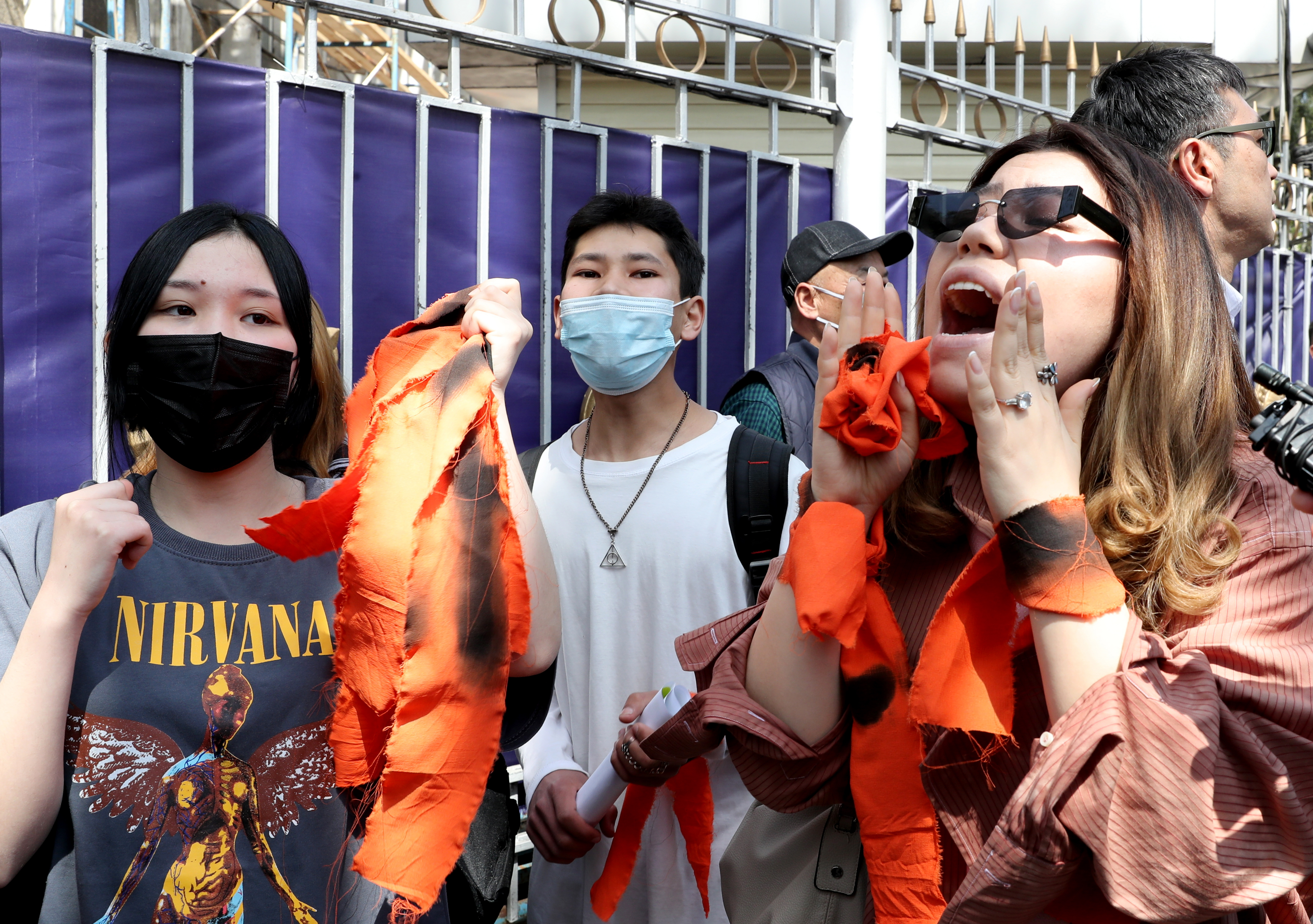 People attend a rally to support women's rights in Bishkek