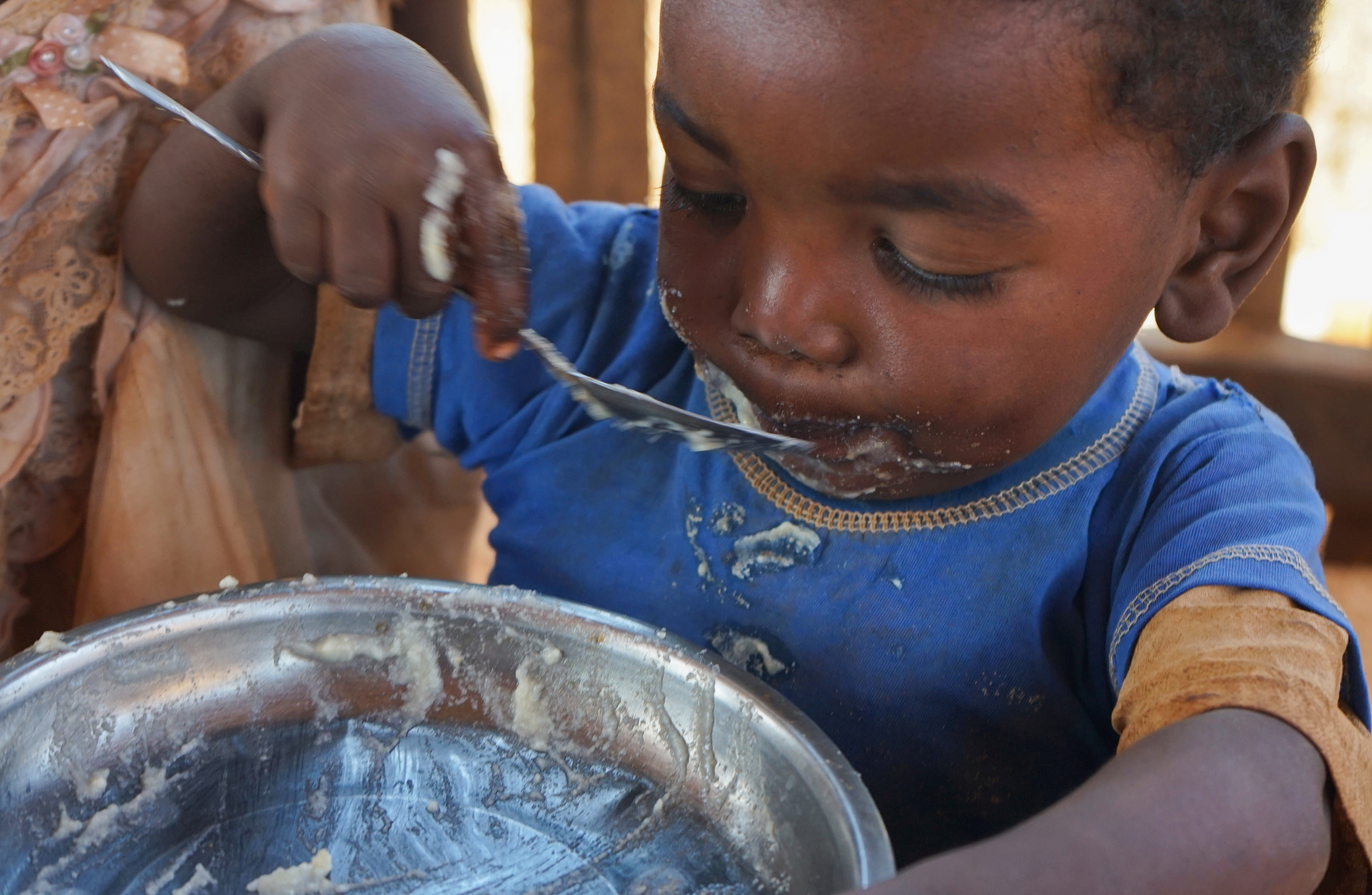 A child eats a meal